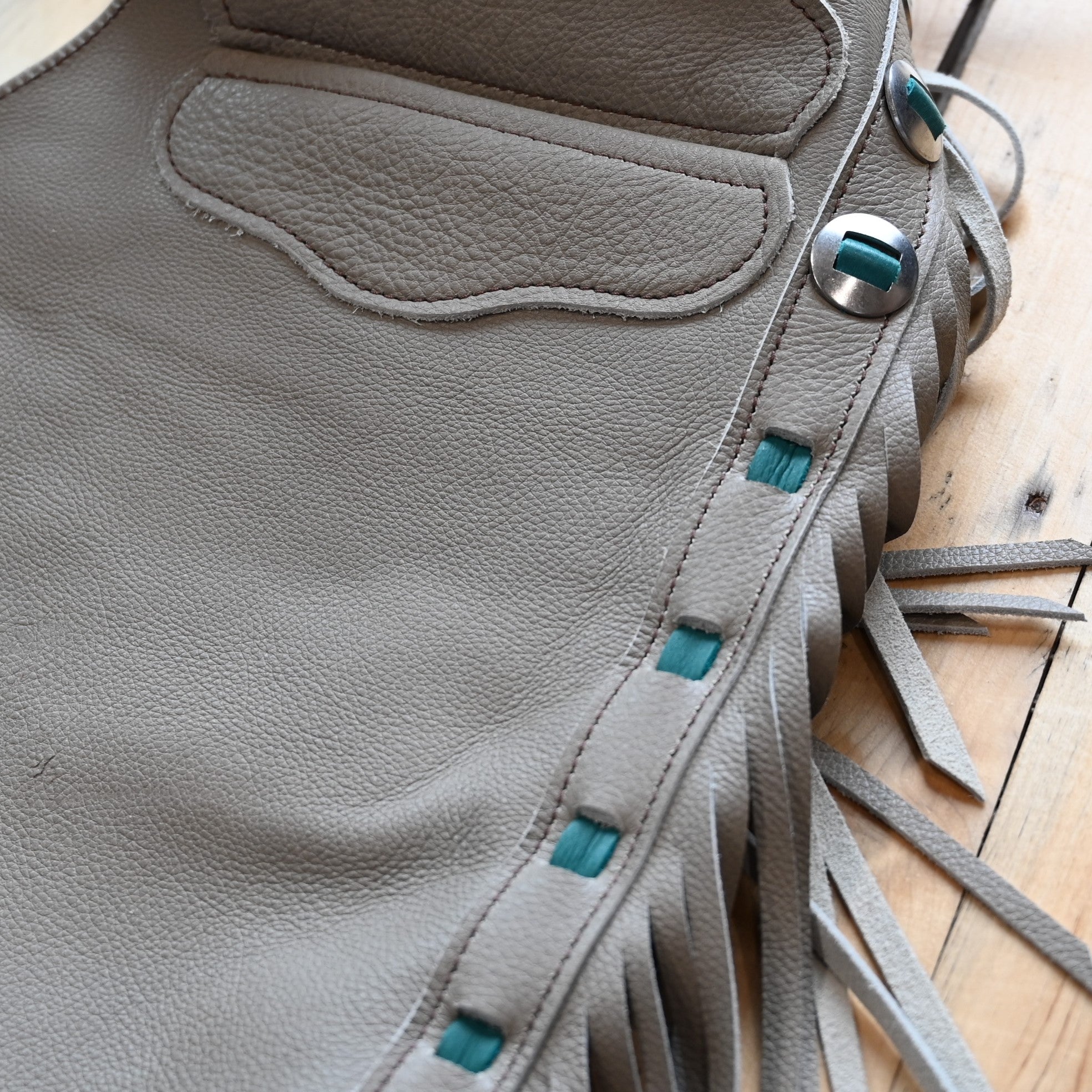 View of K Bar J Borderline Versatility Chap in Medium with fringe and leather border