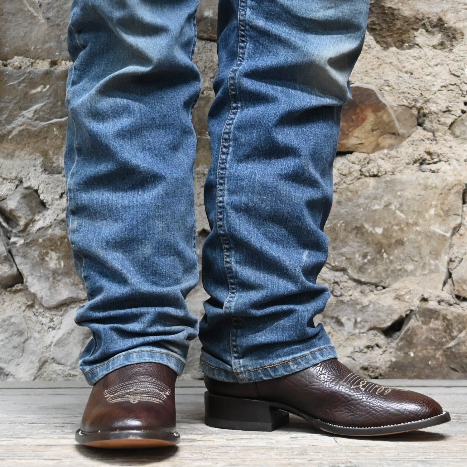 View of Hondo 11" cowboy boot with brown cowhide vamp, brown top, and medium round toe