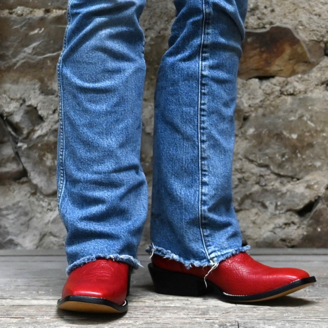 View of Hondo 13" cowboy boot with red cowhide top, red shoulder vamp, and medium square toe