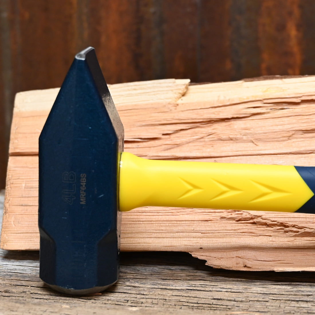 Estwing 64 oz blacksmith’s hammer with forged steel head and fiberglass handle