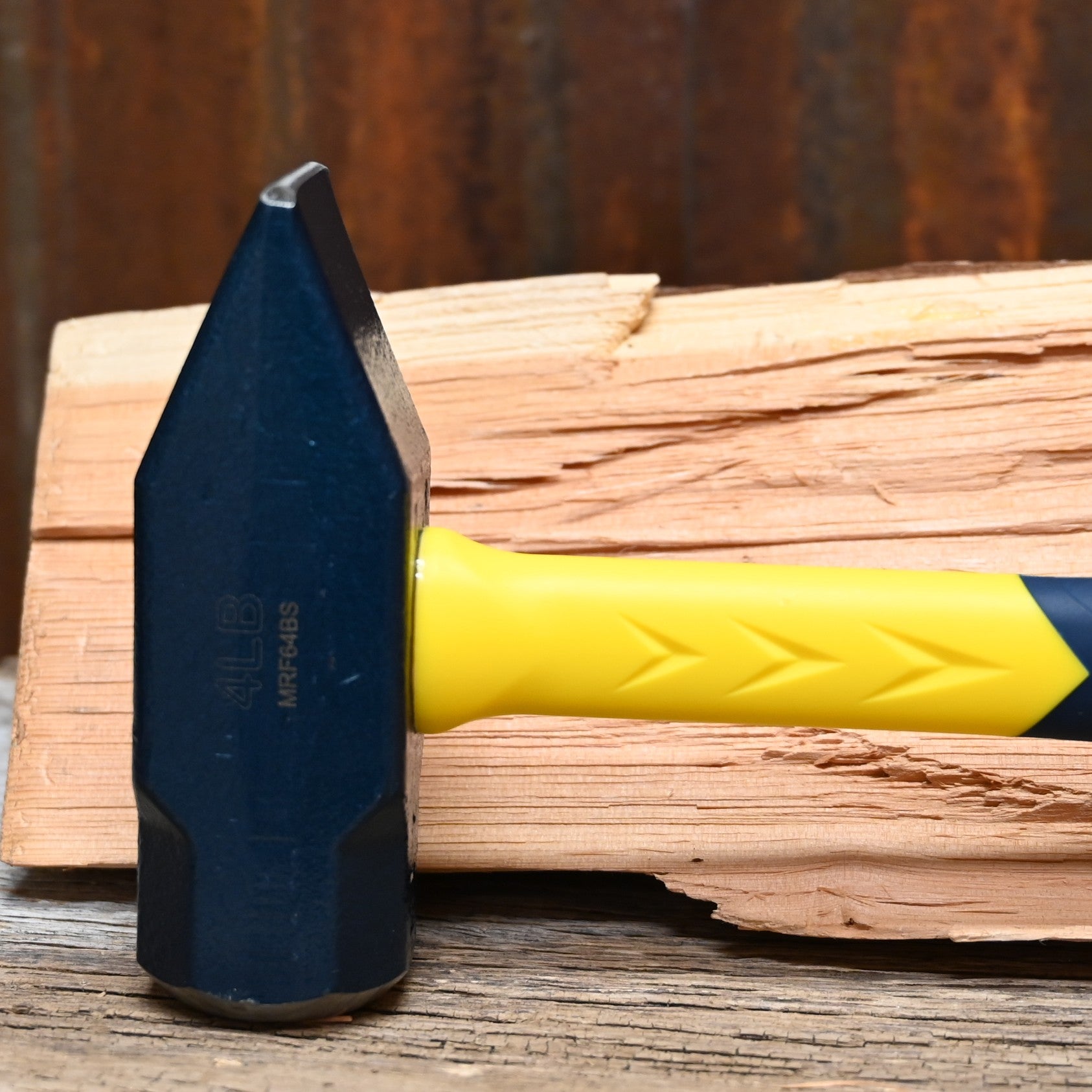 Estwing 64 oz blacksmith’s hammer with forged steel head and fiberglass handle