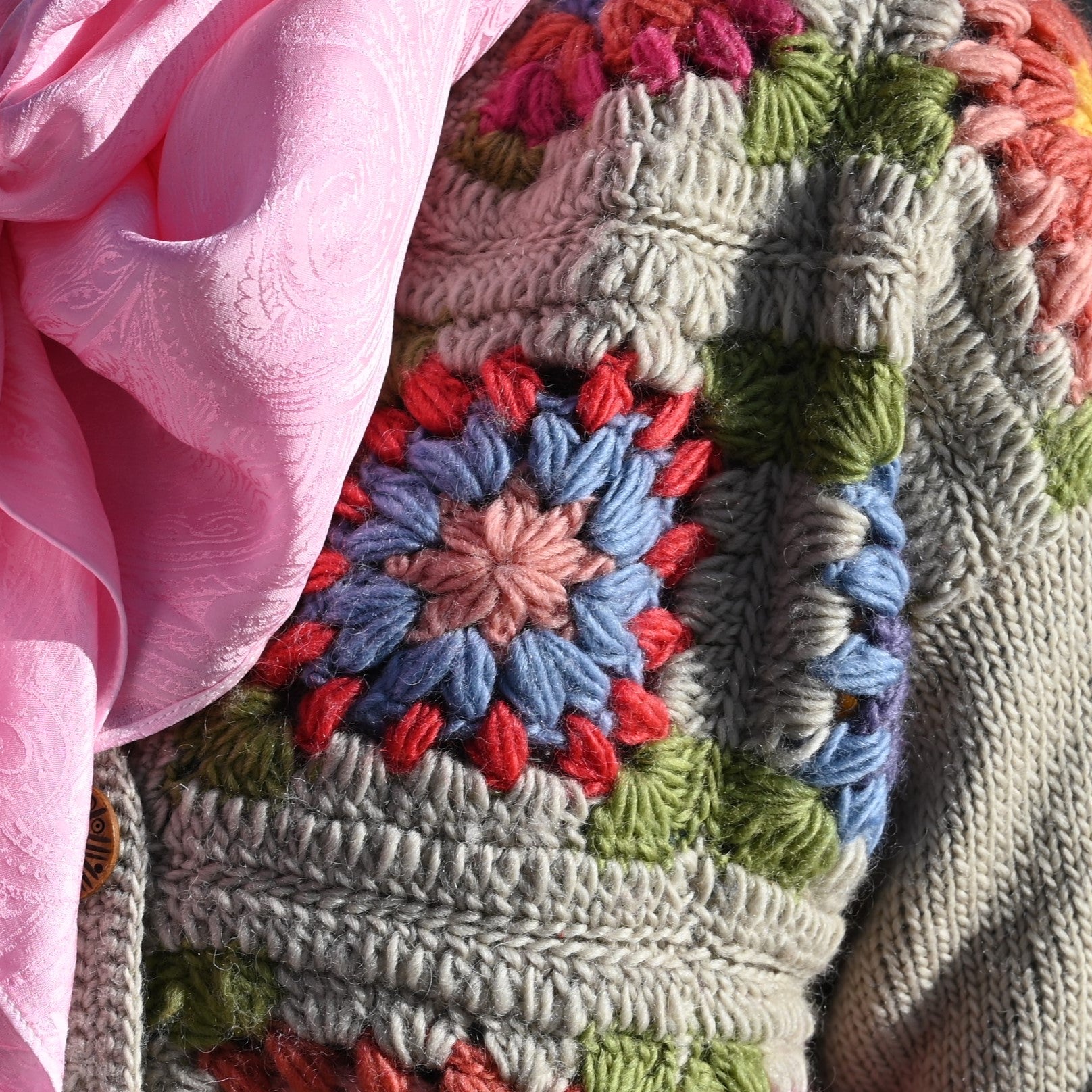 Camelia ladies wool knit taupe cardigan with multicolor 70s floral design and button-up front