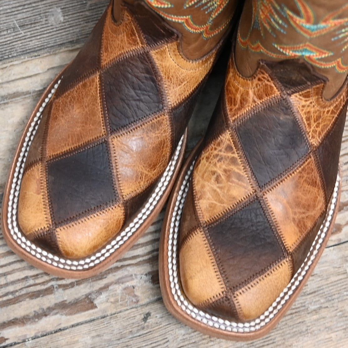 View of Horse Power kids boot with patchwork vamp, honey top, square toe, and pull tabs