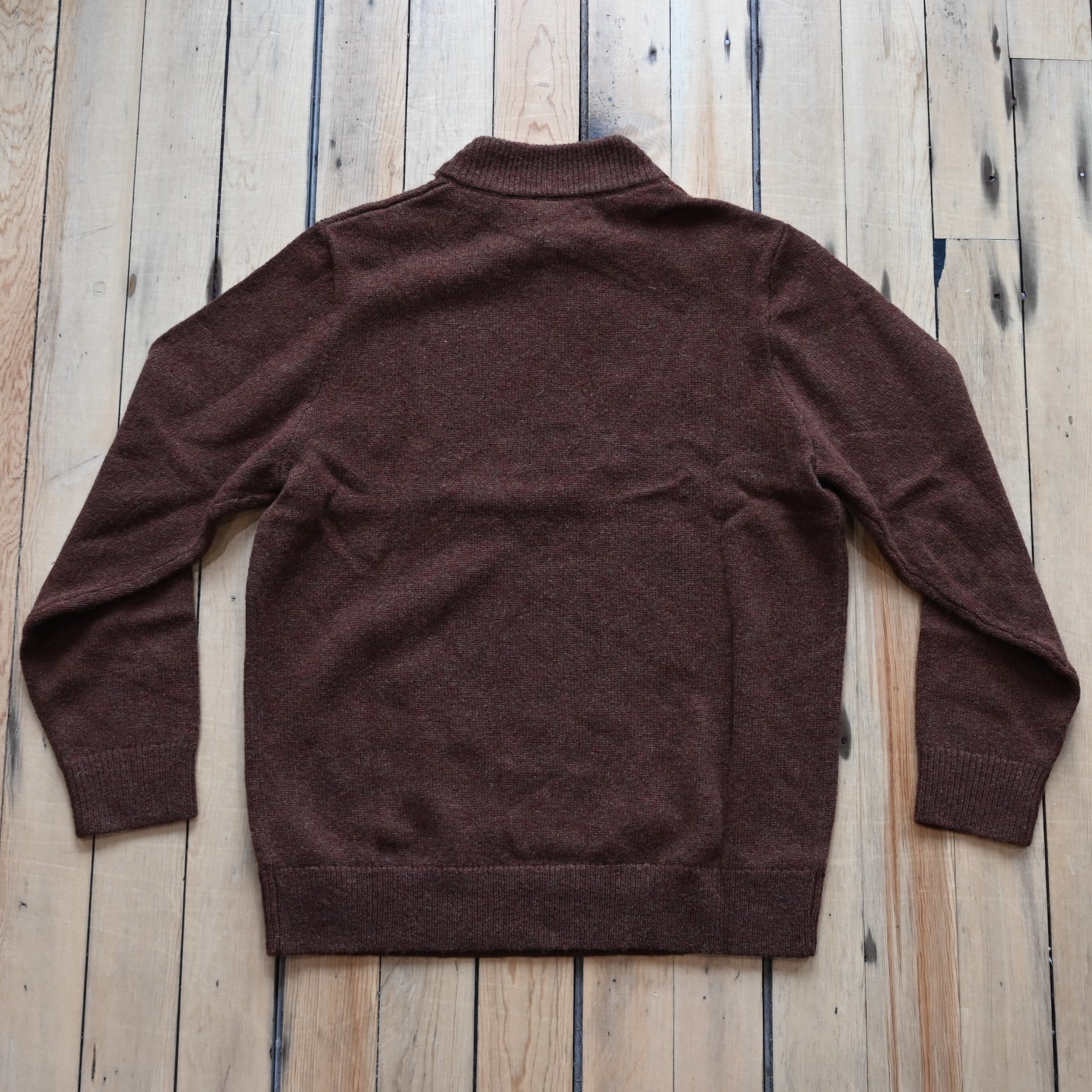 View of Pendleton men’s Shetland wool ¼ zip sweater in Spiced Heather with mock neck and ribbed trim