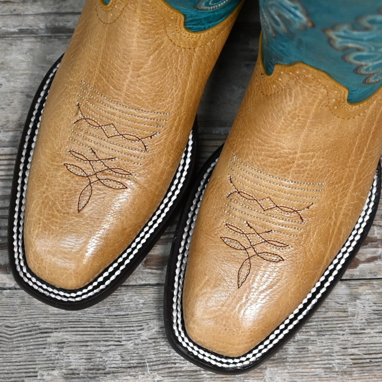 View of Hondo 14" cowboy boot with turquoise volcano top, honey shoulder vamp, and tight square toe
