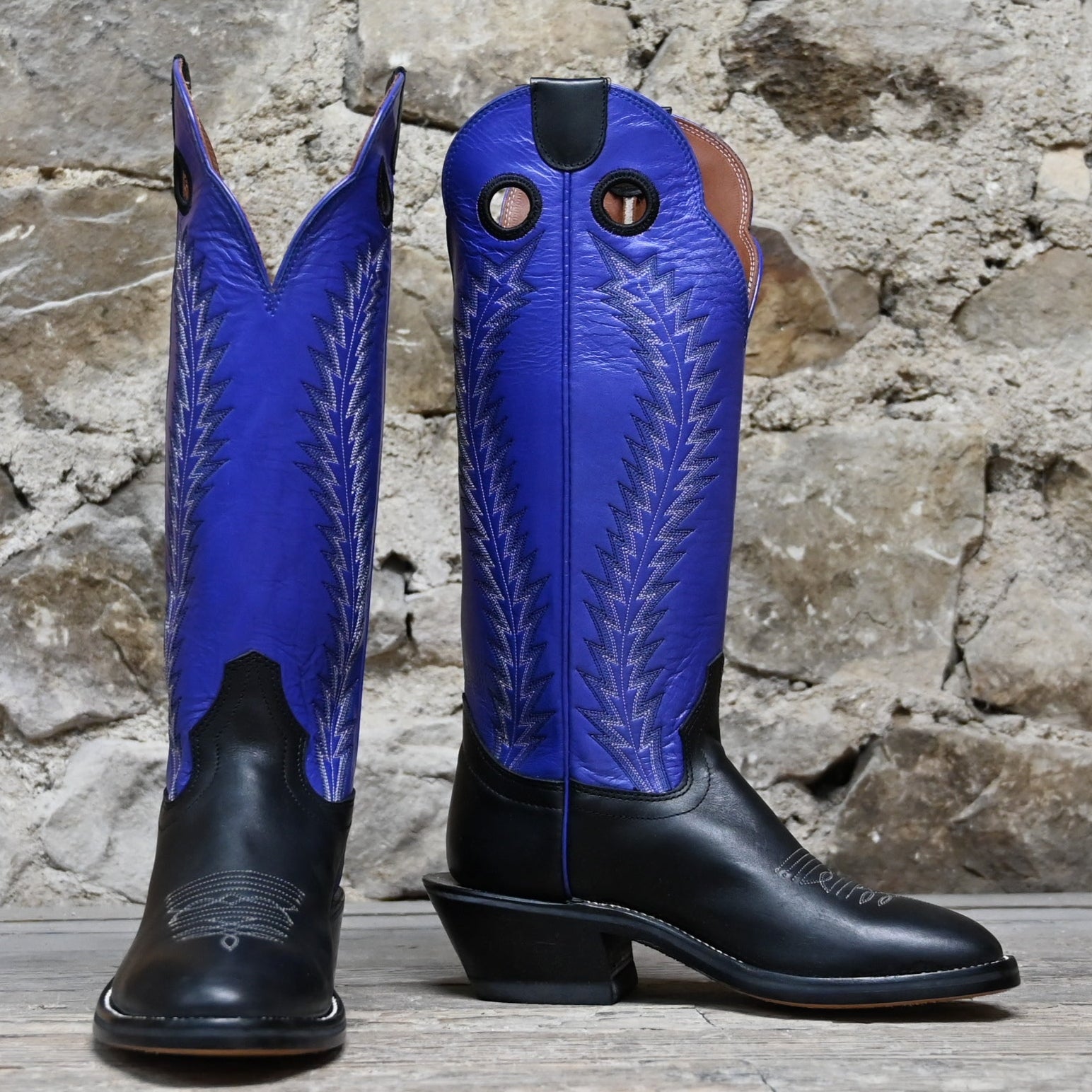 View of Hondo 16" cowboy boot with purple top, black retan vamp, pull holes, and spur ledge