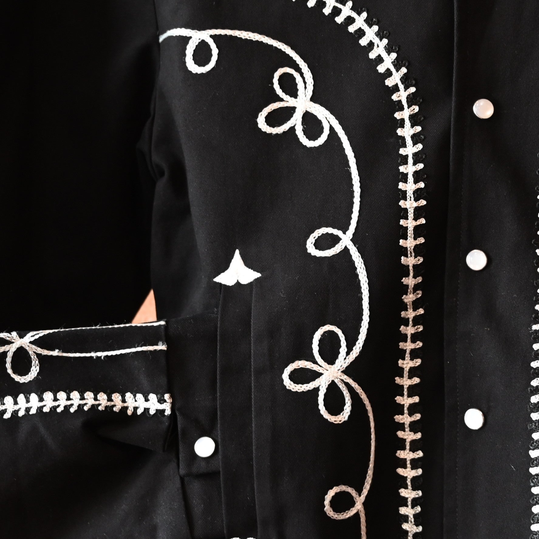 View of Rockmount vintage black gabardine bolero jacket with embroidery and snaps