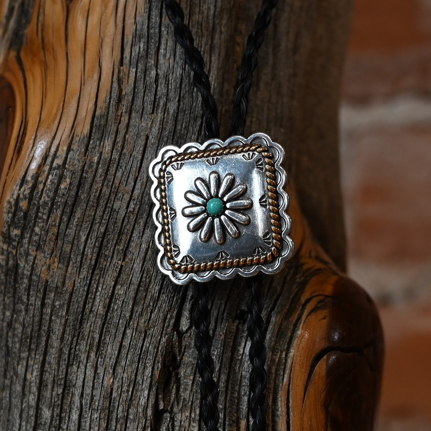 Cowboy Collectibles square turquoise horsehair bolo tie with 1½ inch concho and metal tips