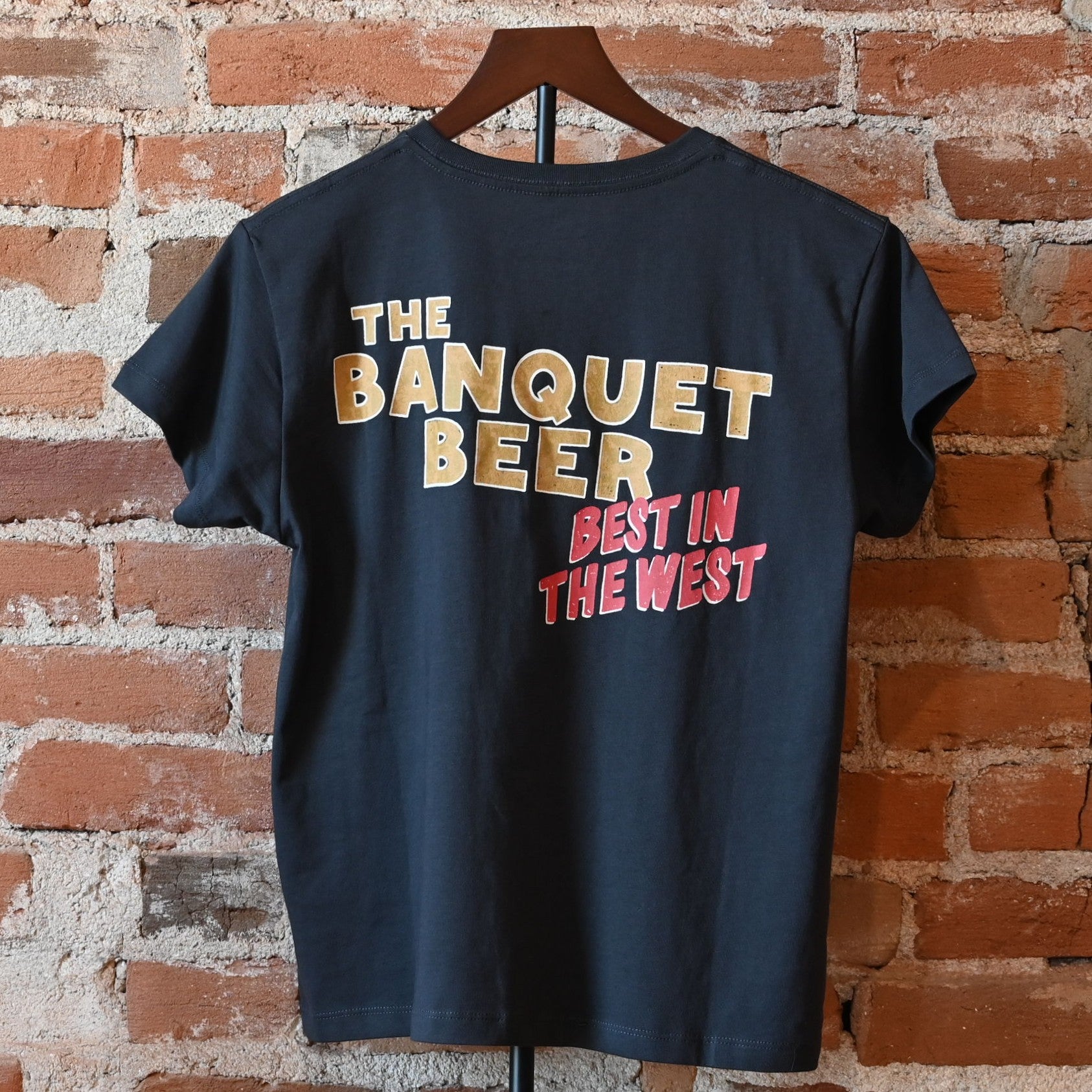Wrangler x Coors Ladies Banquet Tee in black with bronc rider and Coors logo graphics