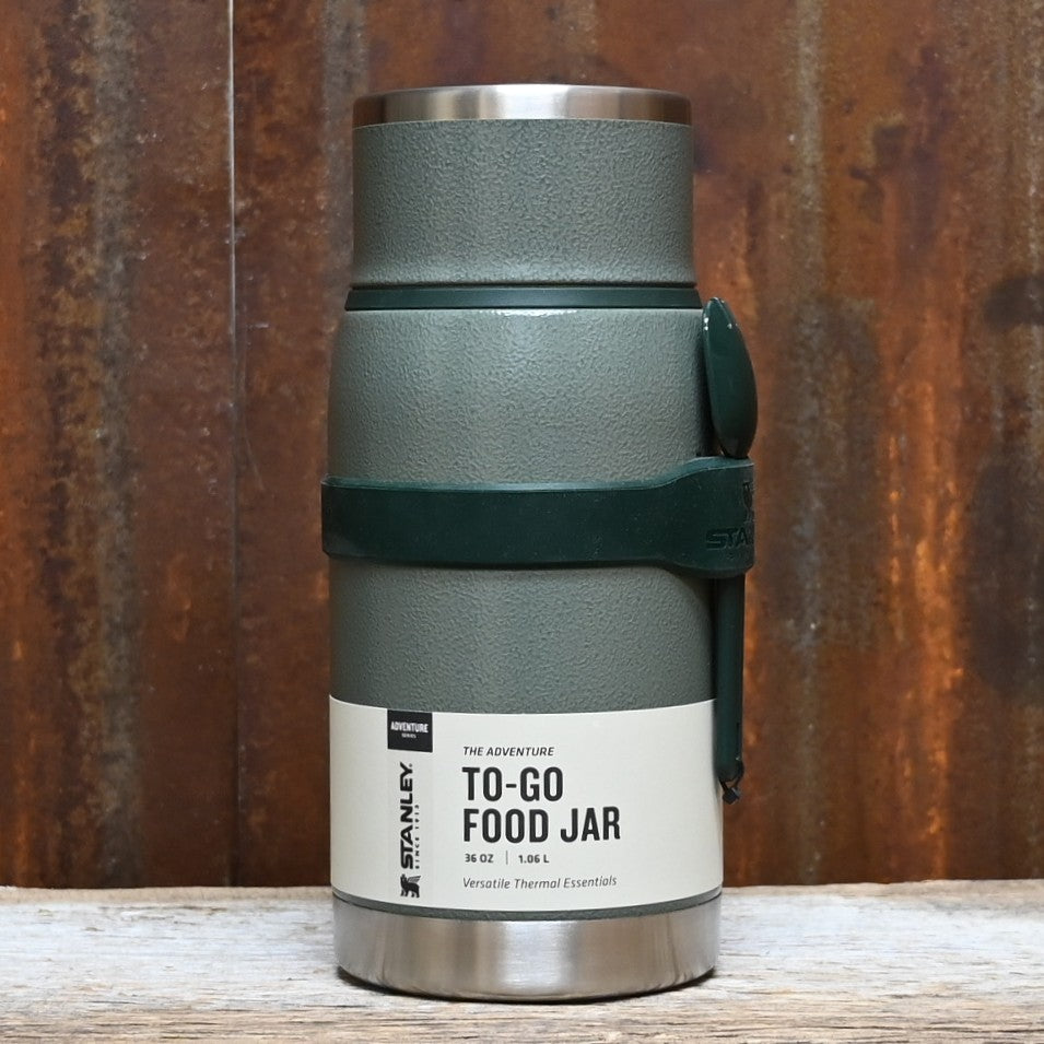 Stanley Adventure 36oz To-Go Food Jar in Hammertone Green with lid-bowl and spork.