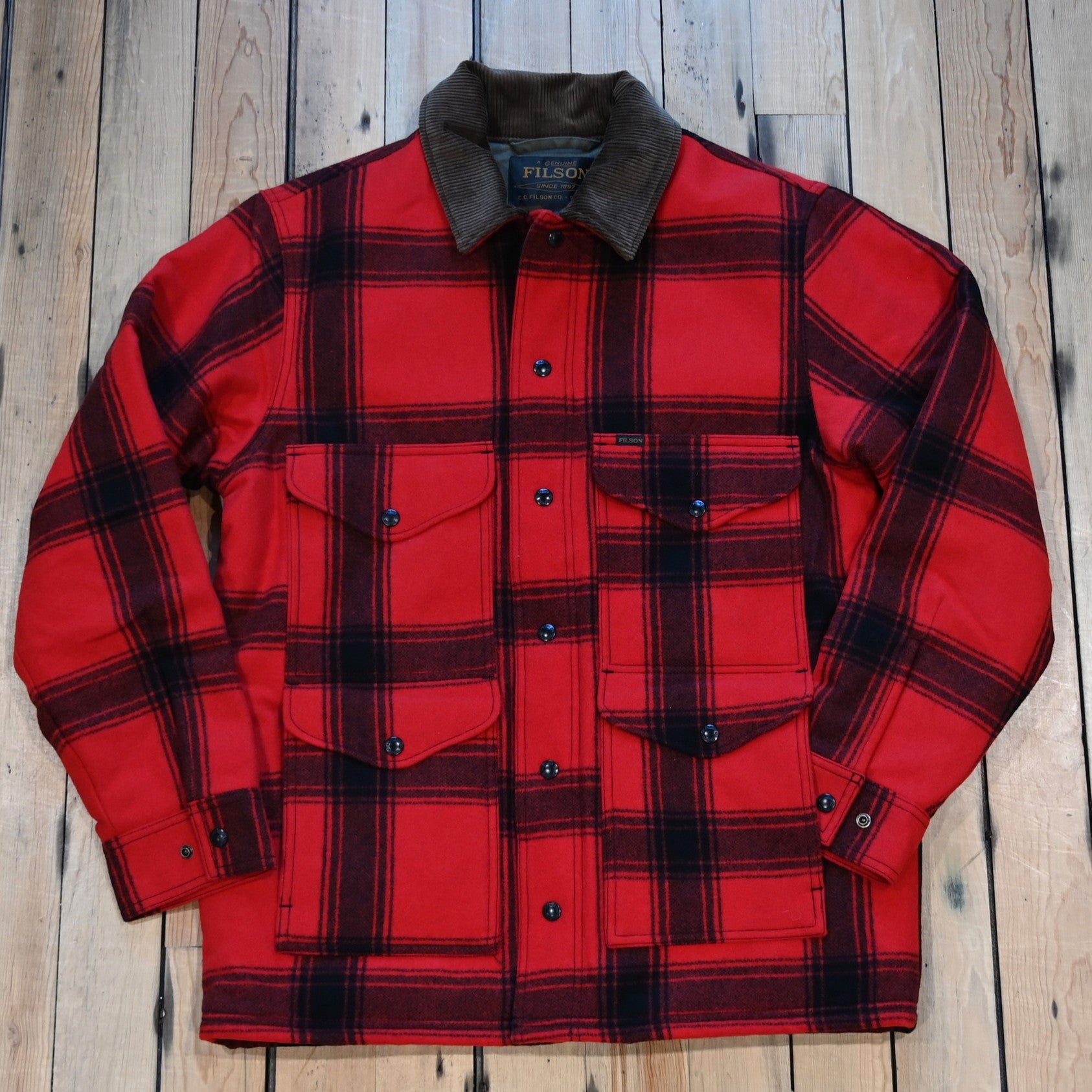 Filson Spokane Insulated Cruiser Jacket in red/black windowpane with snap front and flap pockets