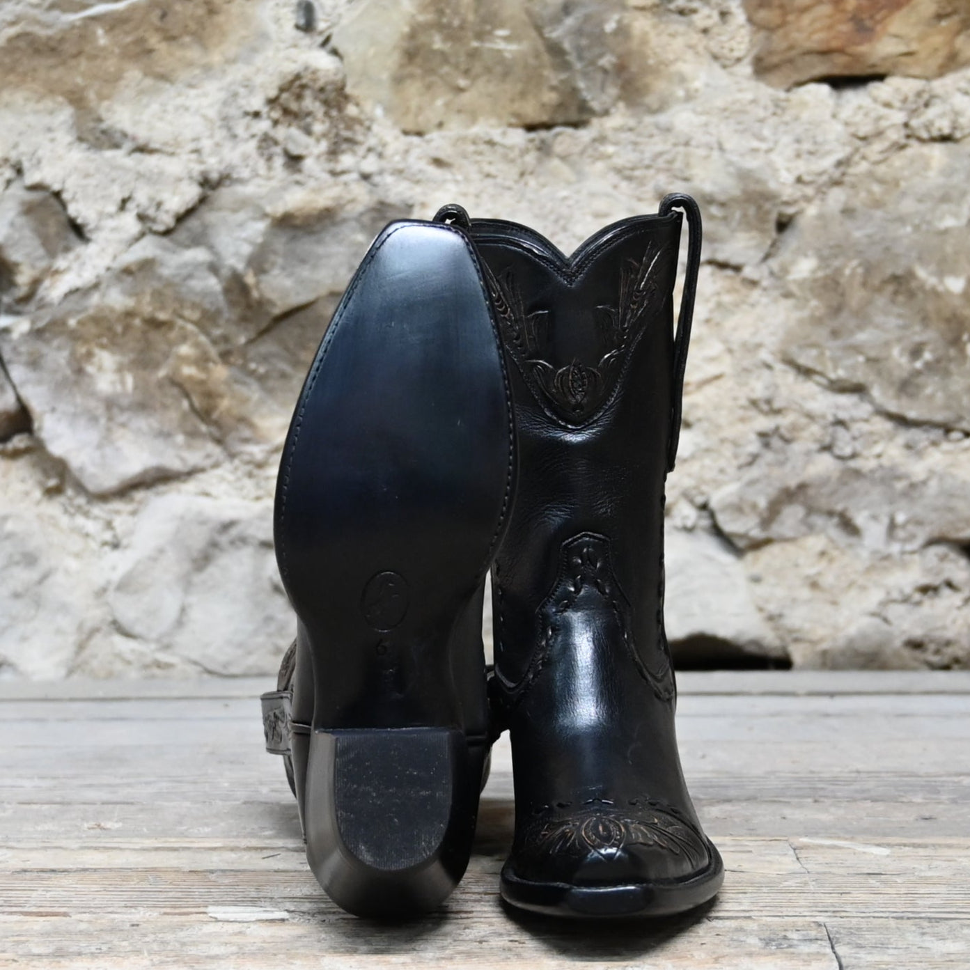 View of Stallion Ladies 10" Black Ranch Hand Boot with tooled top, whipstitch, and buck lacing