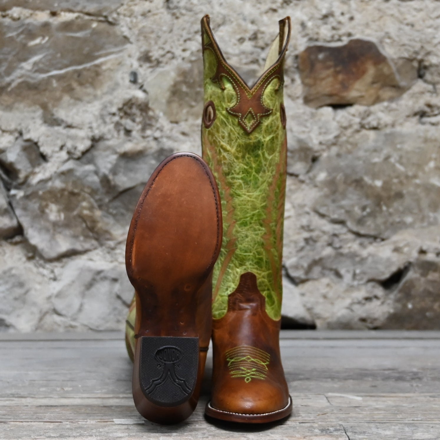 View of Hondo 16" cowboy boot with lime crater top, tan waxy vamp, pull holes, and spur ledge