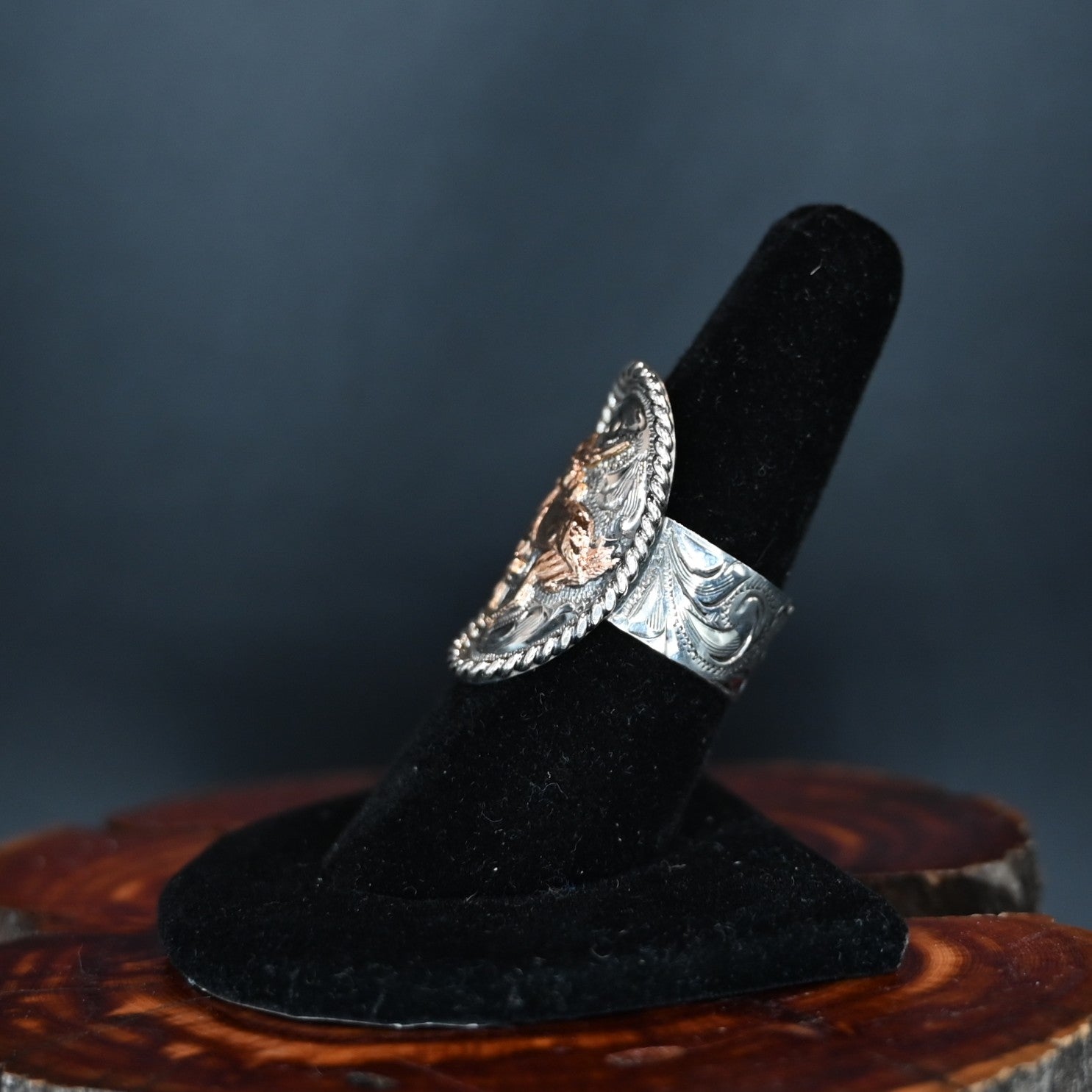 Vogt Silversmiths Turn ’Em Loose sterling silver ring with hand-twisted rope edge and 3D bronc centerpiece