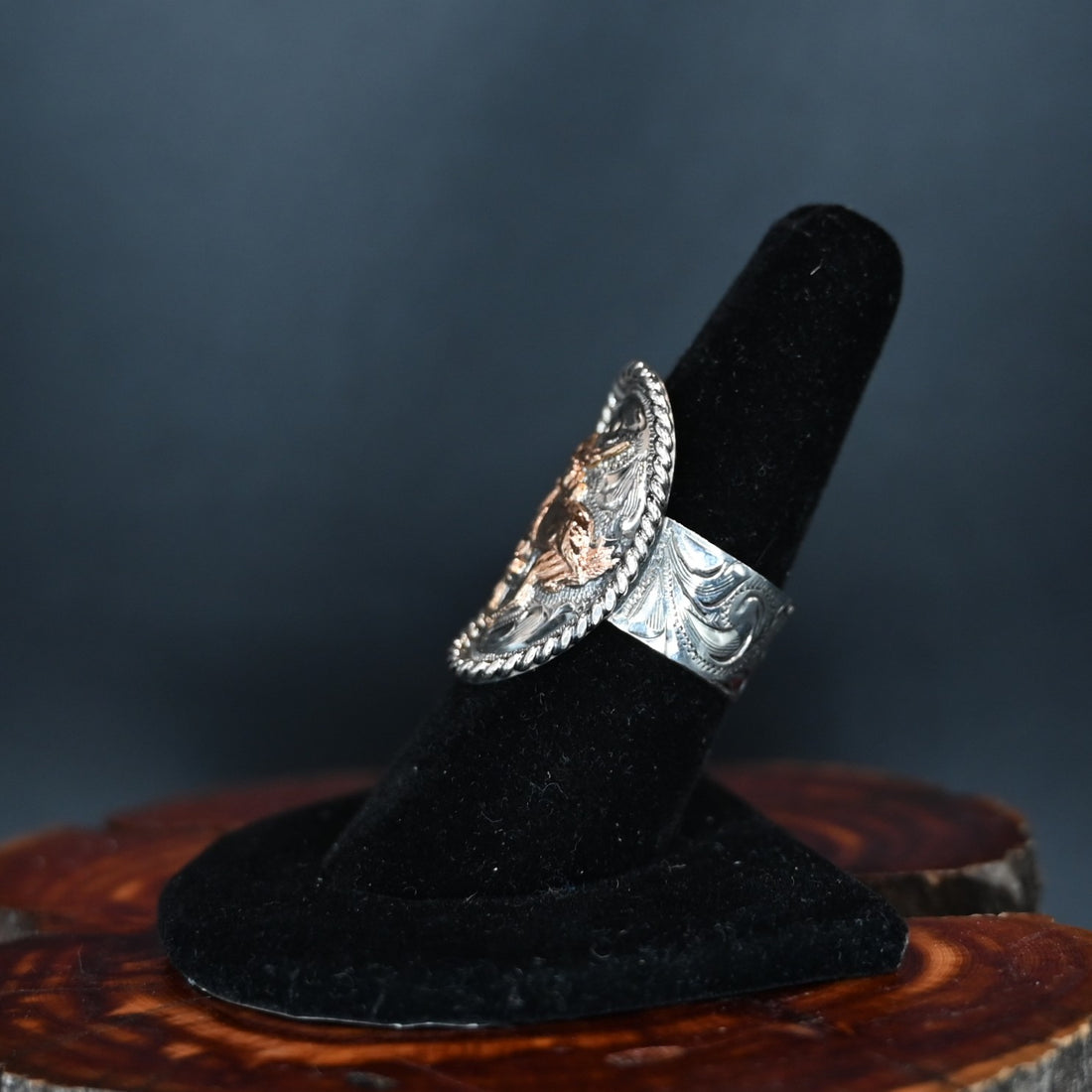 Vogt Silversmiths Turn ’Em Loose sterling silver ring with hand-twisted rope edge and 3D bronc centerpiece