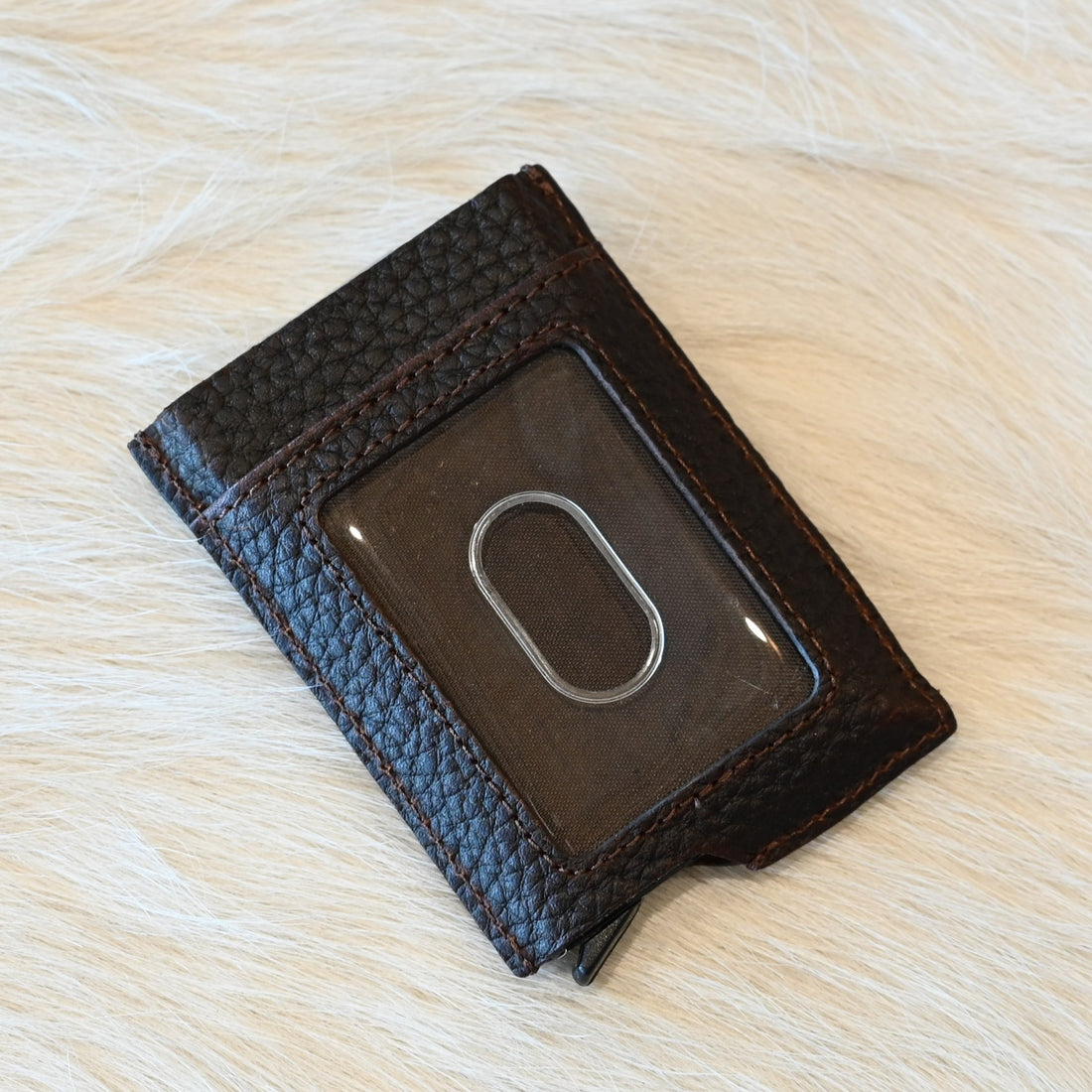 Utility Wallet With Pressure Release Lever