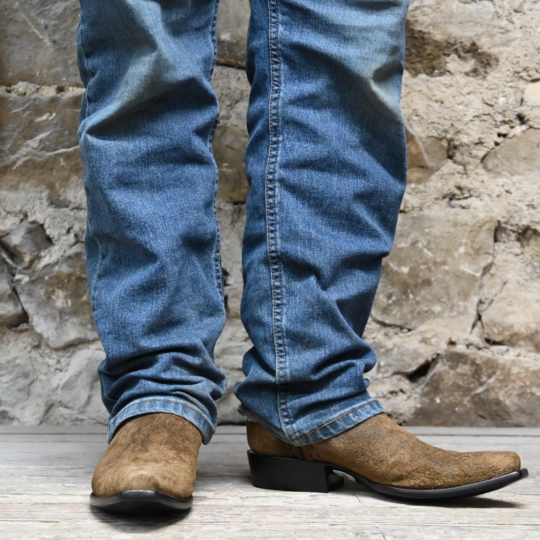 View of Stallion snip‑toe ankle boot in distressed camel kid with chocolate buckstitching and side zipper