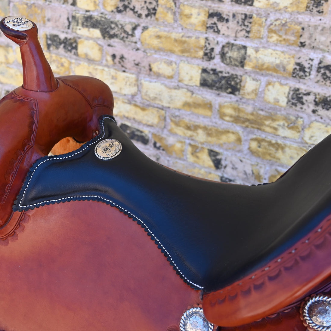 View of Billy Cook 16" Russet Trail Saddle with large camouflage border tooling