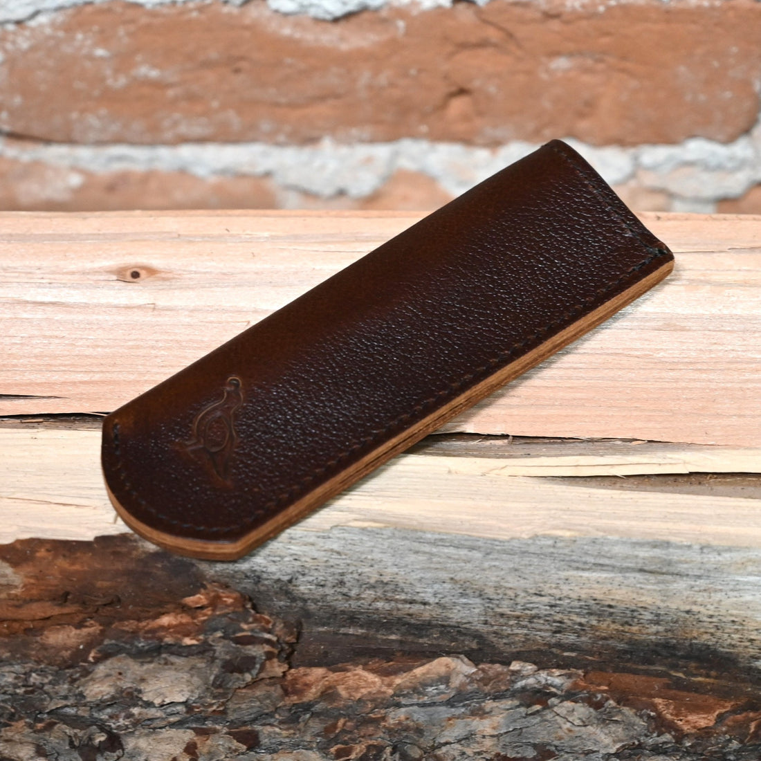 View of Smithey Ironware Leather Skillet Sleeve – Extended made from oil-tanned leather, designed to protect your hands from hot skillet handles