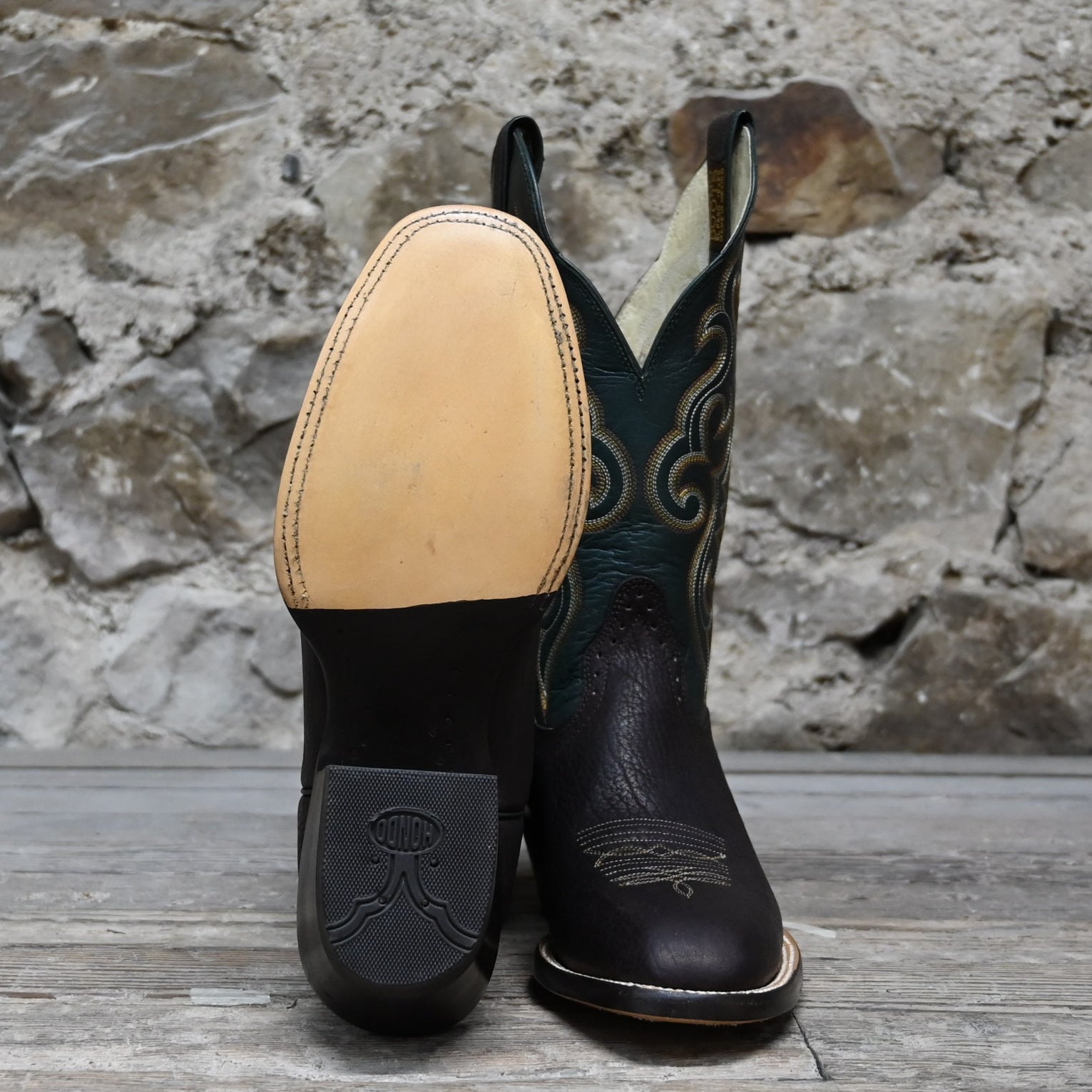 View of Hondo 13" cowboy boot with forest green top, cocoa pull up vamp, and tight French square toe