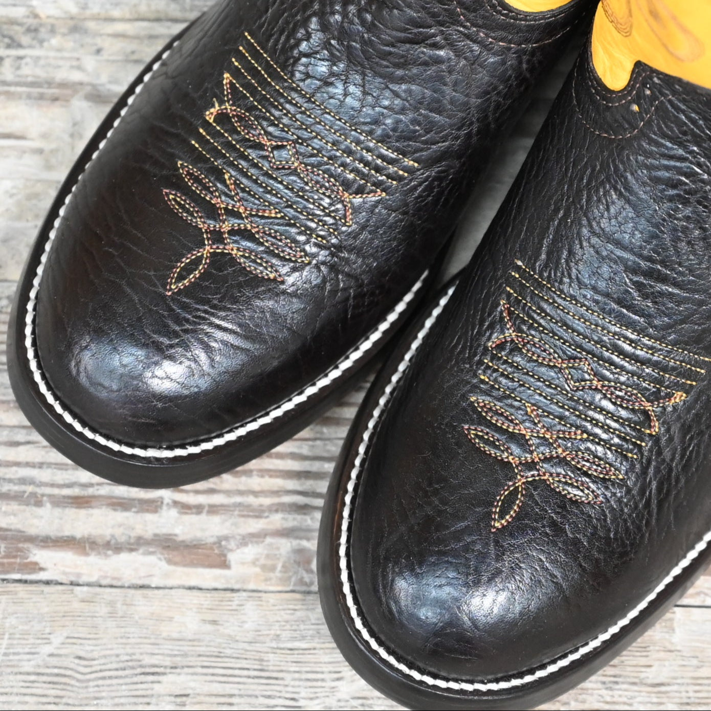 View of Hondo 13" cowboy boot with yellow top, brown shoulder vamp, and wide round toe