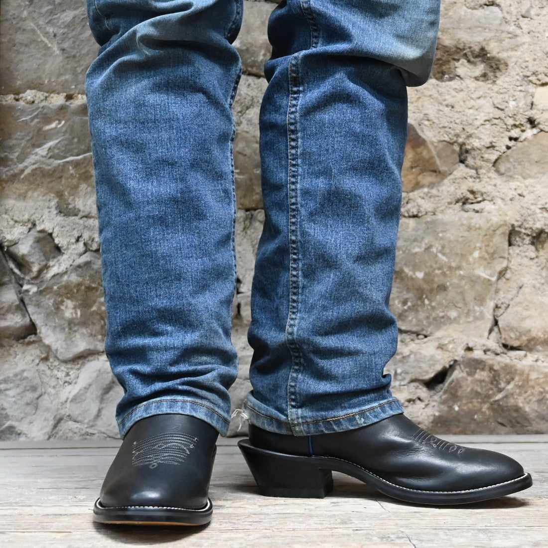 View of Hondo 16" cowboy boot with royal blue top, black retan vamp, pull holes, and spur ledge