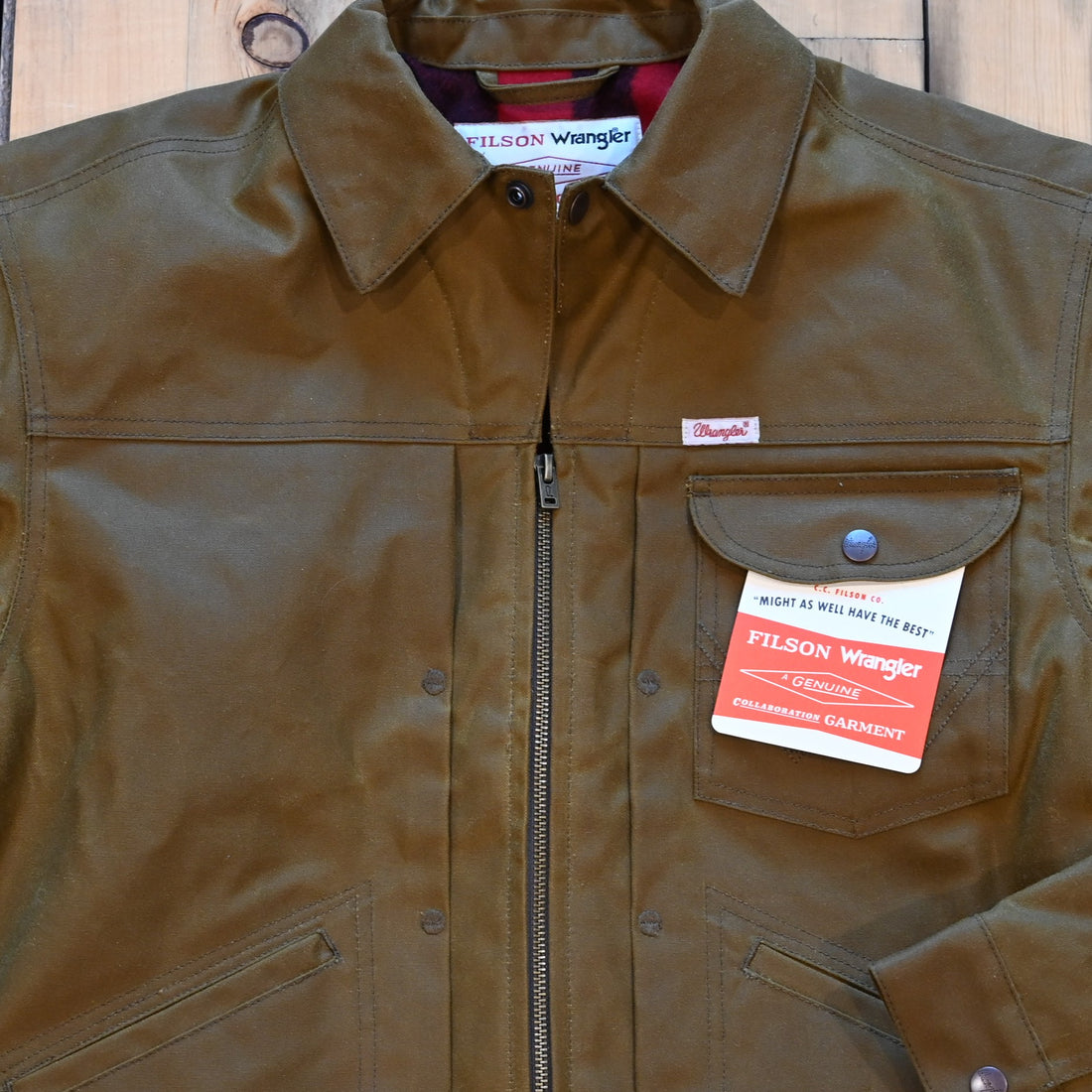 Filson × Wrangler Adventure Jacket in tan, waxed canvas outer with wool lining