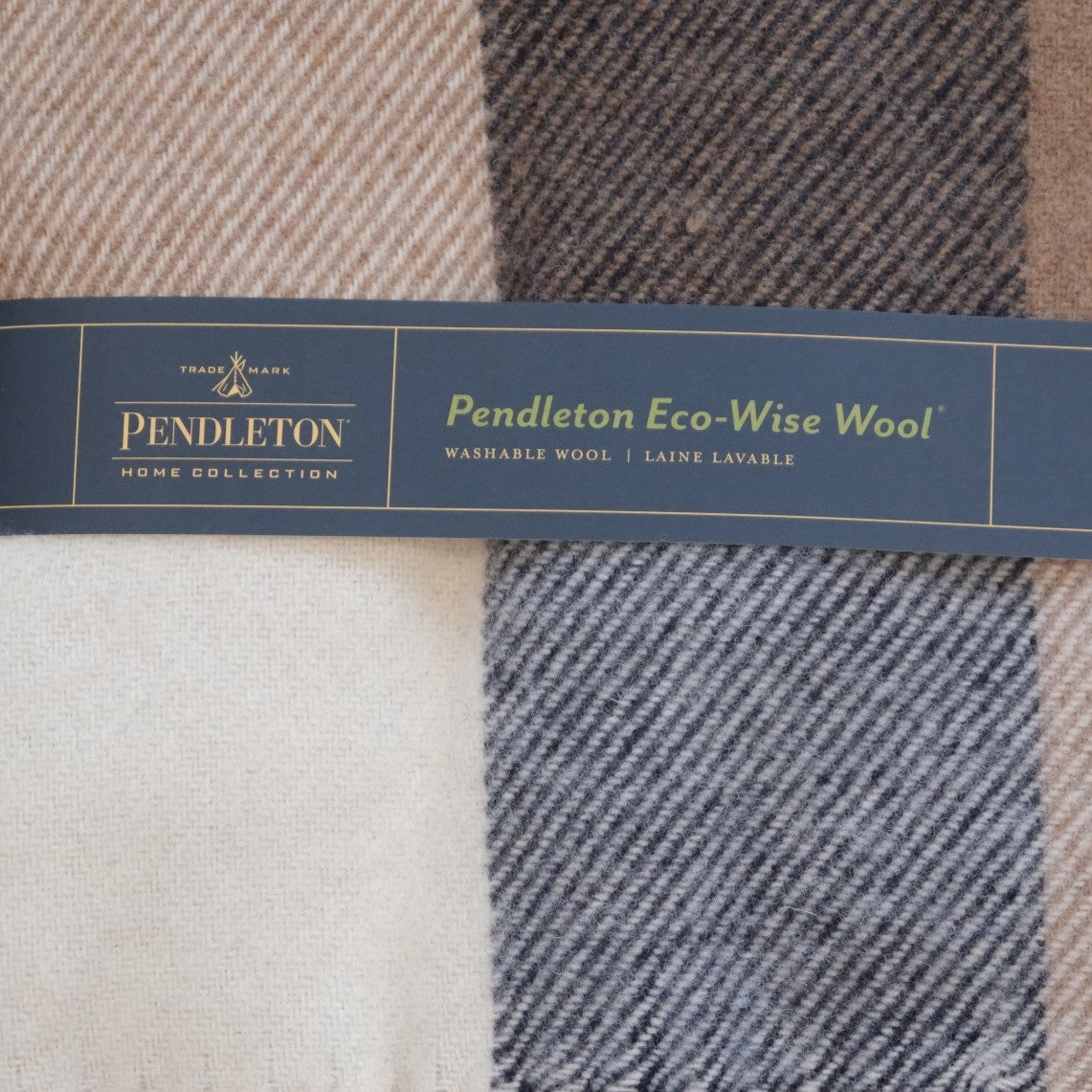 Pendleton Eco-Wise Wool Fringed Throw blanket in a classic woven pattern.