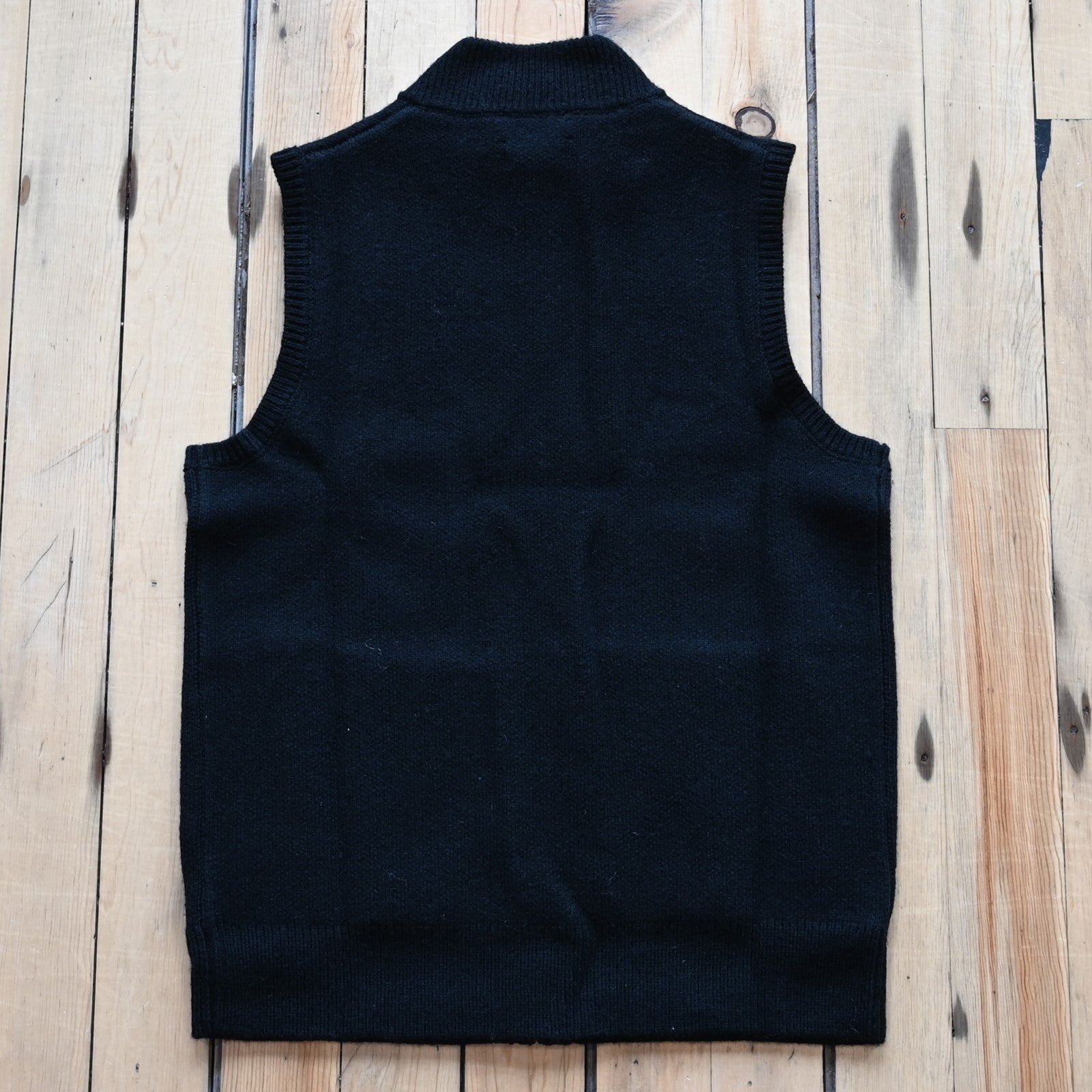 View of Pendleton men’s wool sweater vest in black khaki with zip front and mock neck