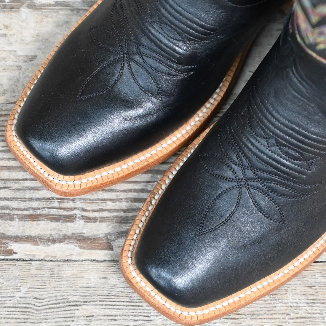 View of Hyer LEAWOOD 13" boots showcasing black top-shelf cowhide with black vamp, Cutter toe, and leather stacked heel