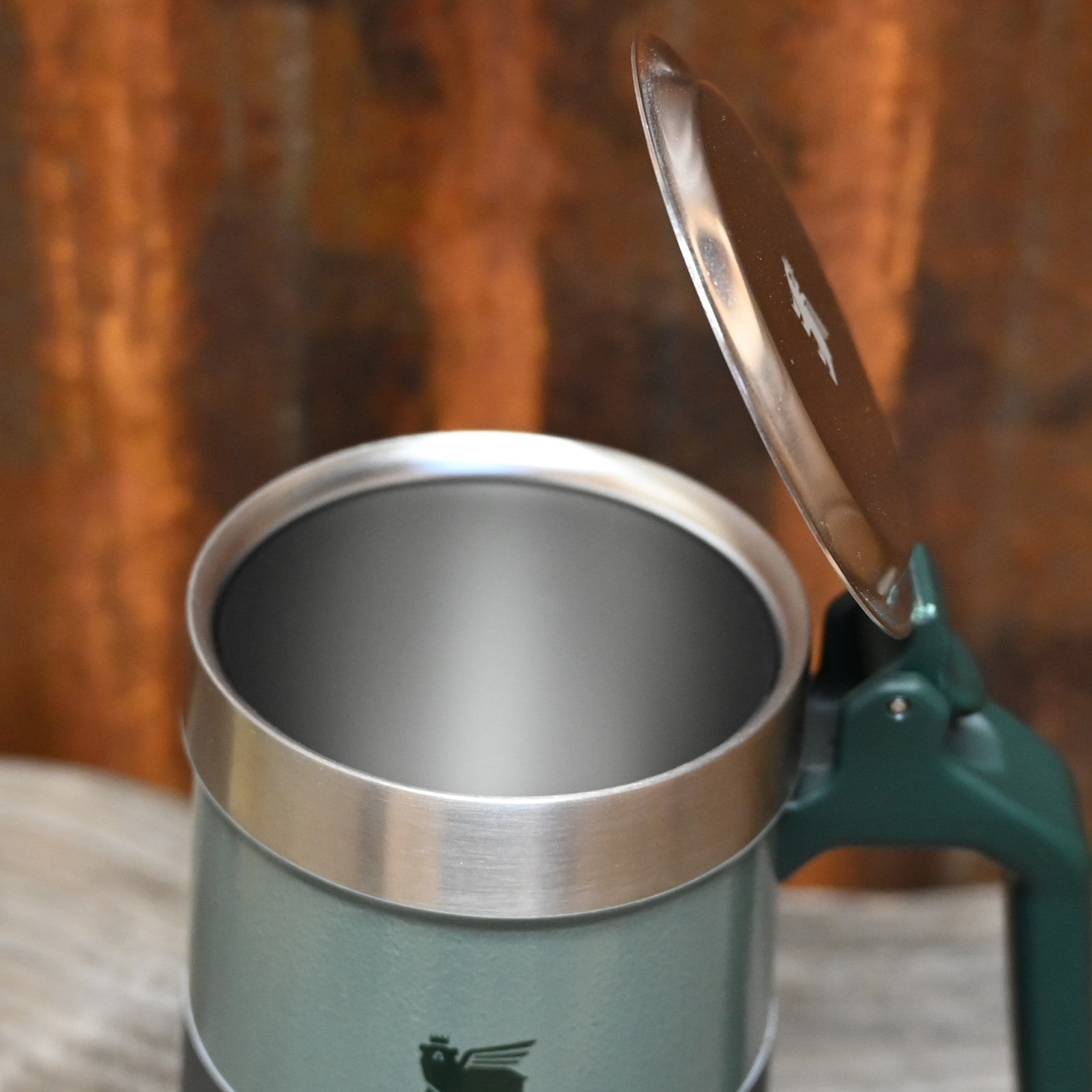 Stanley 24oz Classic Stein in Hammertone Green with vacuum insulation.