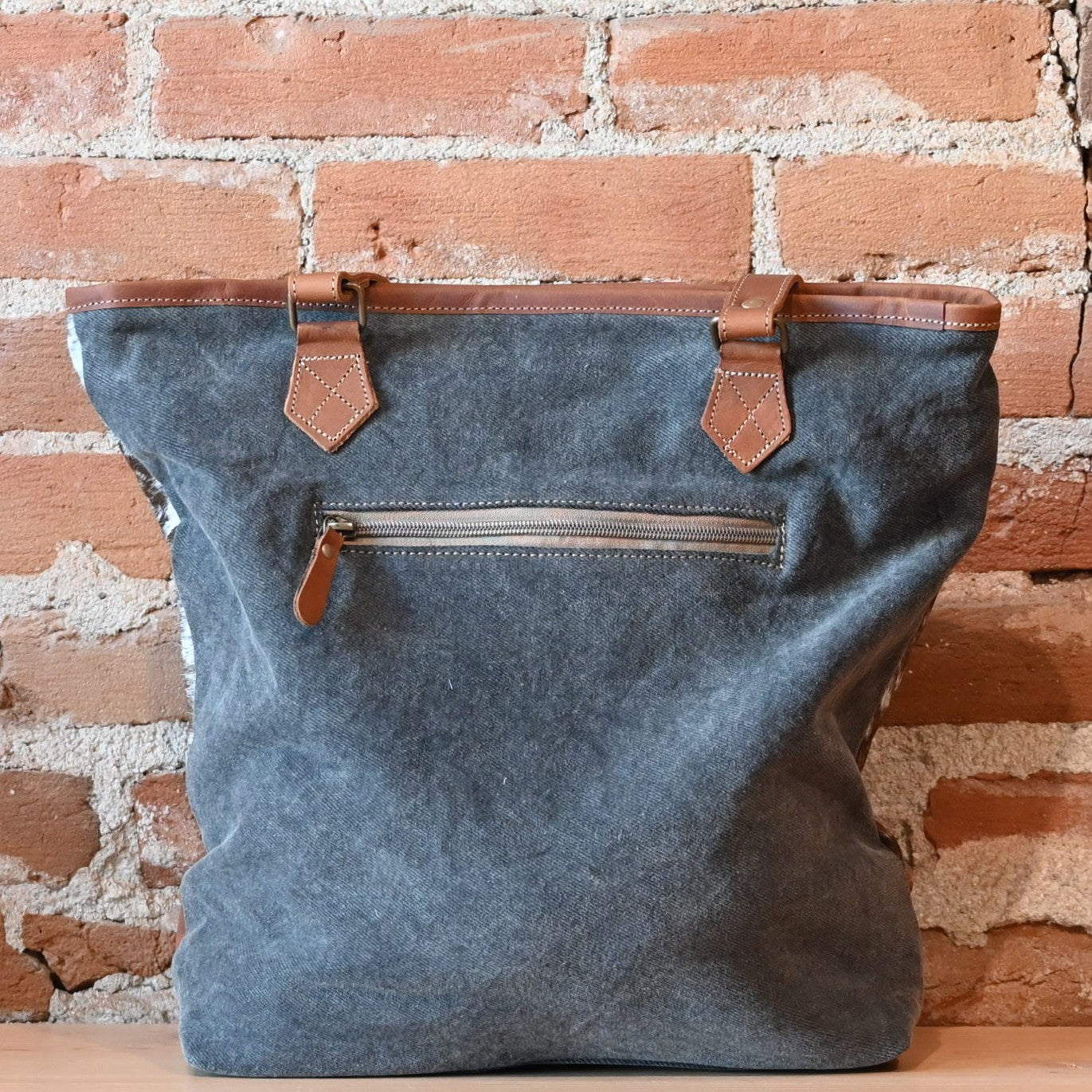 Myra Stone Valley tote bag with leather, hairon, and woven rug design