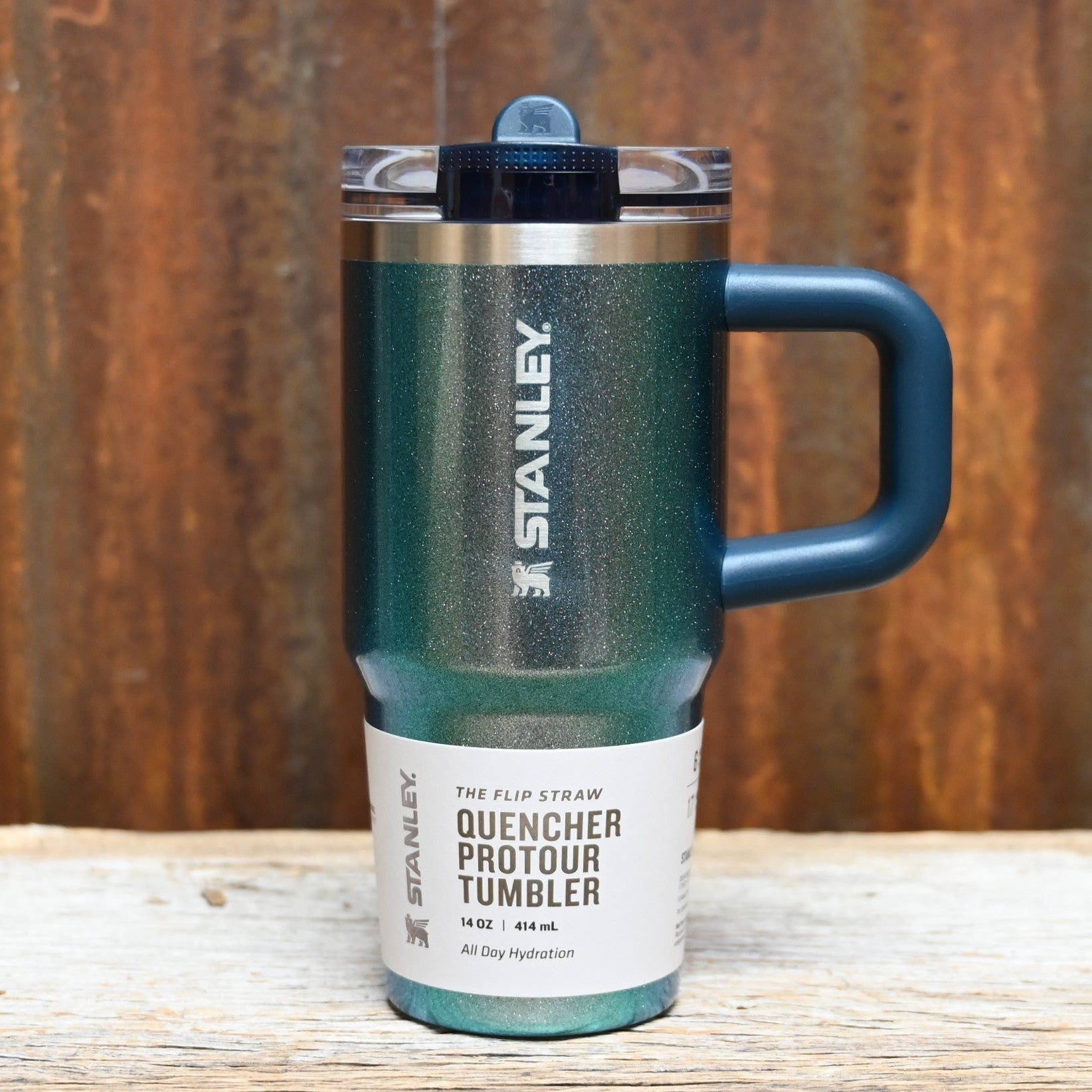 Stanley Quencher ProTour Flip Straw Tumbler 14 oz in Ponderosa Shimmer blue with flip straw lid and textured handle