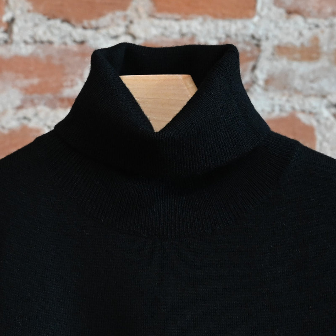 View of Pendleton ladies merino turtleneck in black with ribbed collar and sleeves
