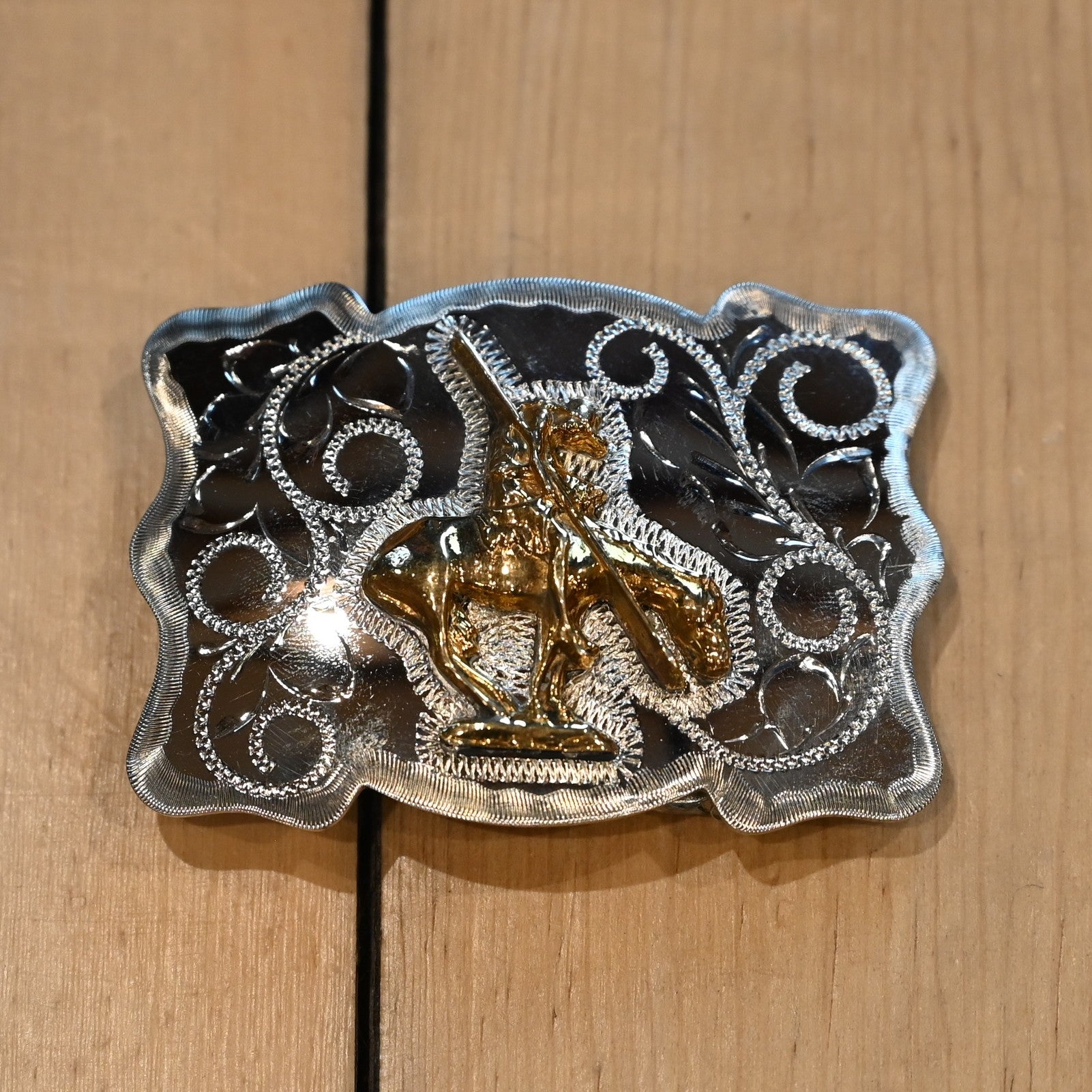 Rockmount belt buckle with “End of the Trail” relief design of rider and horse