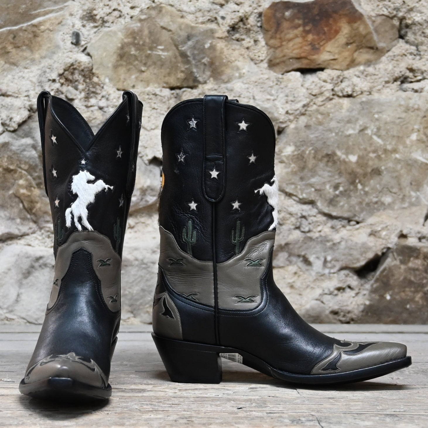 View of Stallion Ladies 11" midnight hair-on boot with gray wingtip, foxing, and multicolor inlays