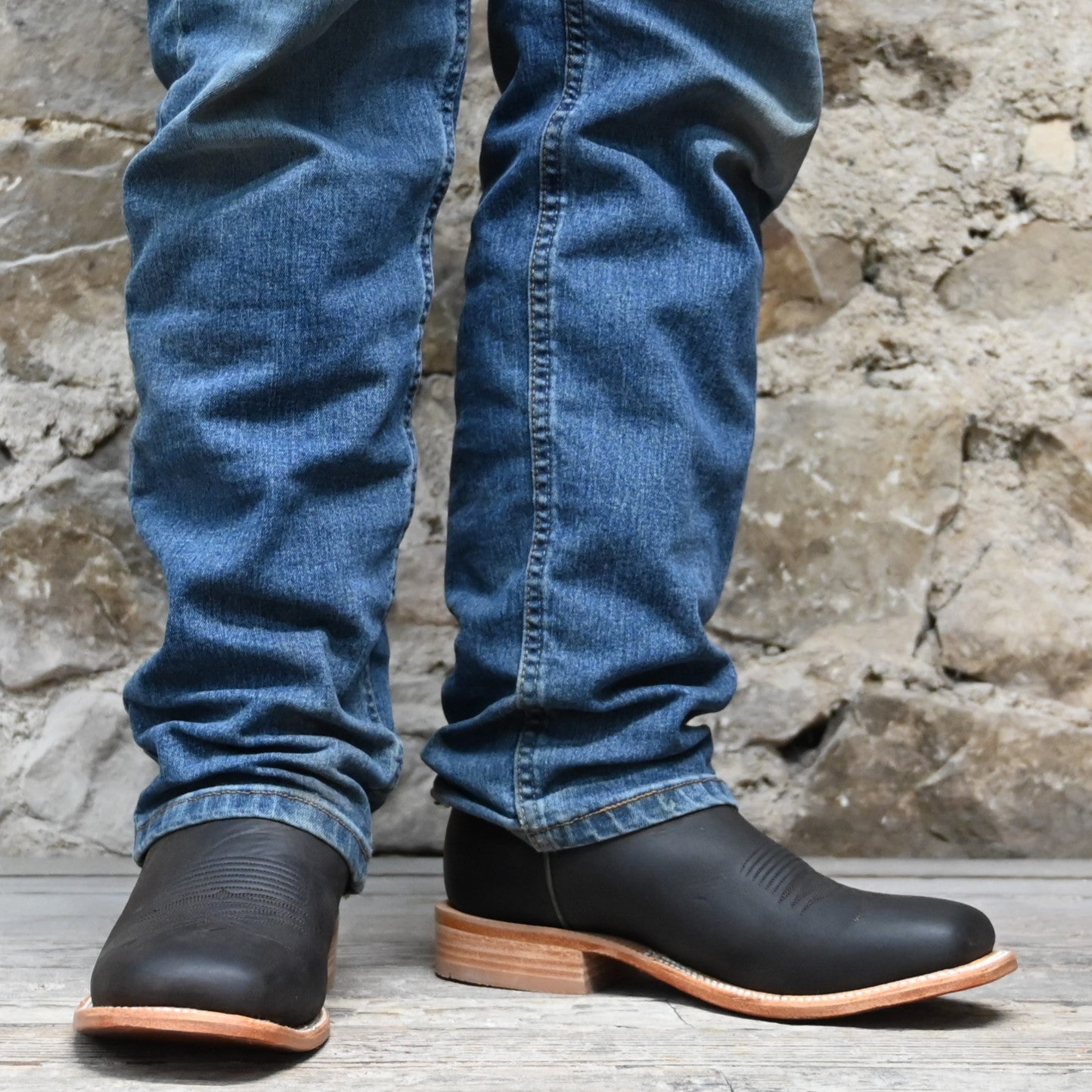View of Hyer CODELL DENIM 13" boots showcasing denim blue Bravo goat leather shaft and chocolate mule cowhide vamp with broad square toe and Stockman block heel