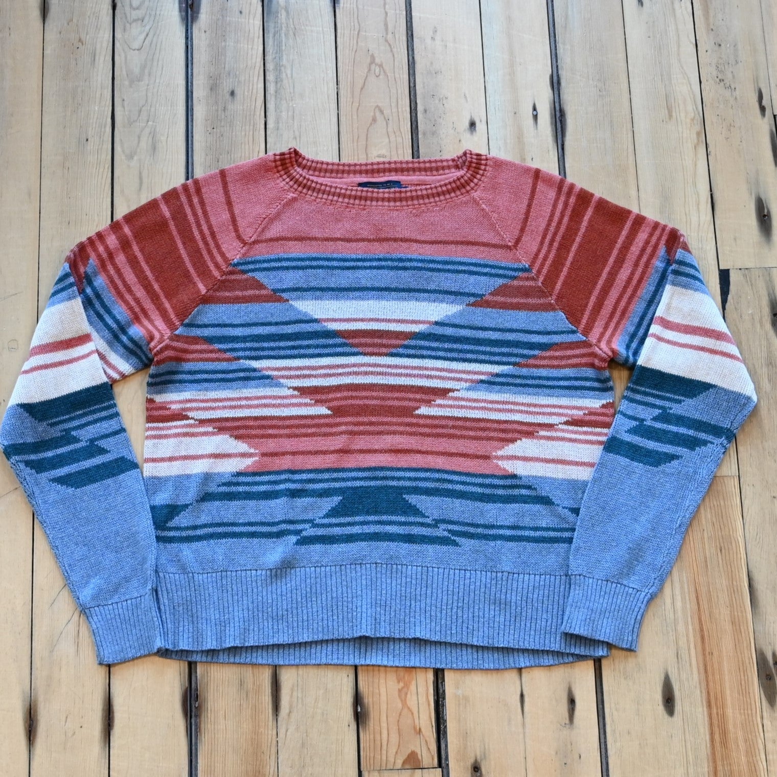 View of Pendleton raglan cotton sweater with Southwestern ombré chest graphic and ribbed crew neck