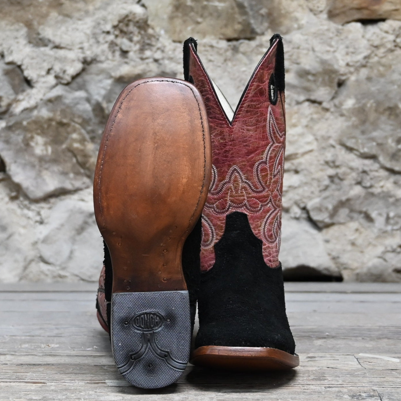 View of Hondo 11" cowboy boot with red crater top, black roughout vamp, wide square toe, and pull holes