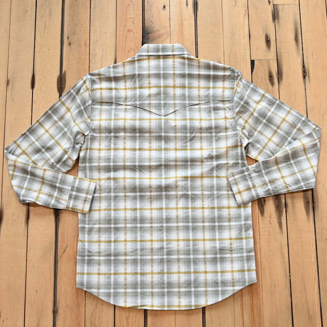 View of RangeTek Western snap shirt in gray and gold Allen plaid with mesh vent and chest pockets