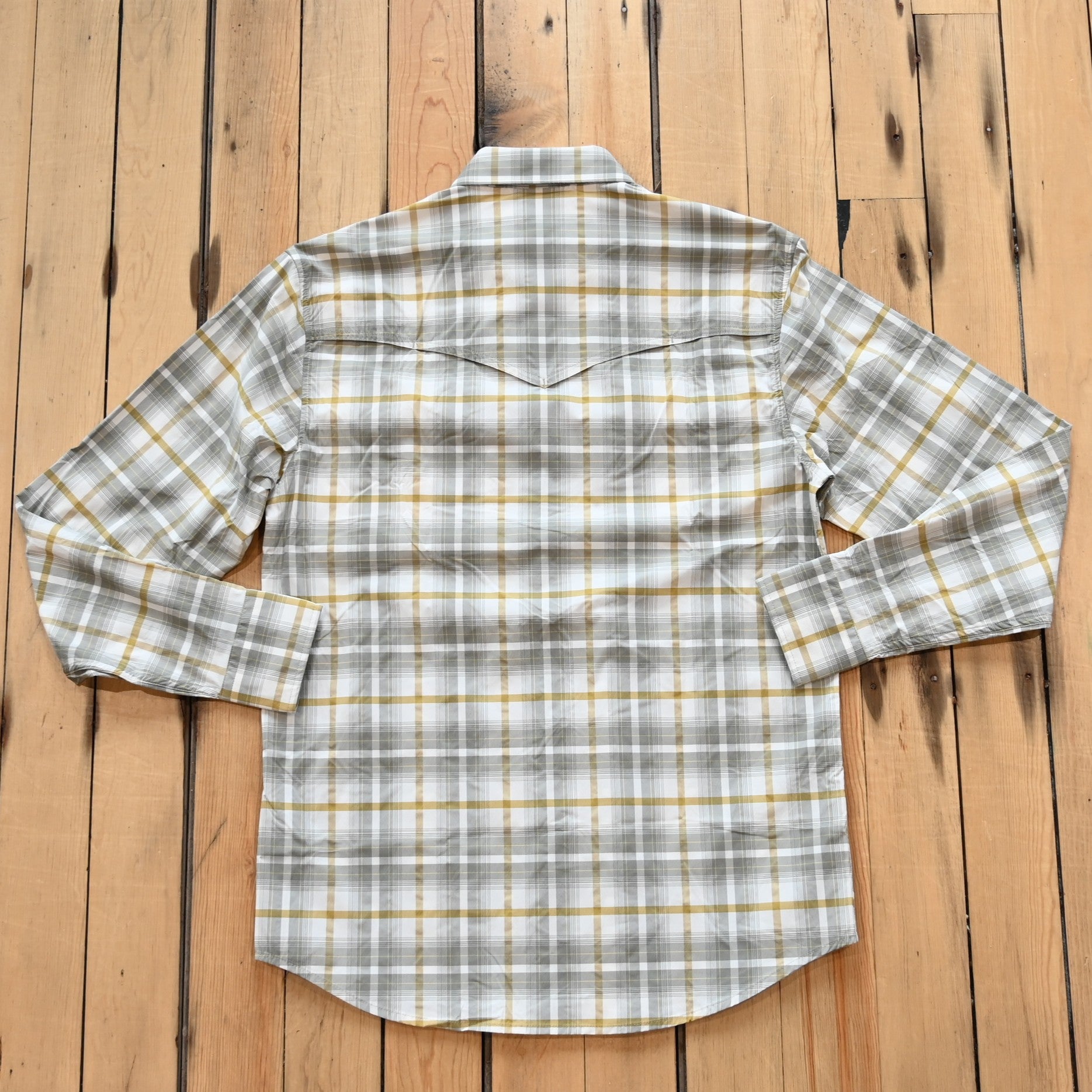 View of RangeTek Western snap shirt in gray and gold Allen plaid with mesh vent and chest pockets