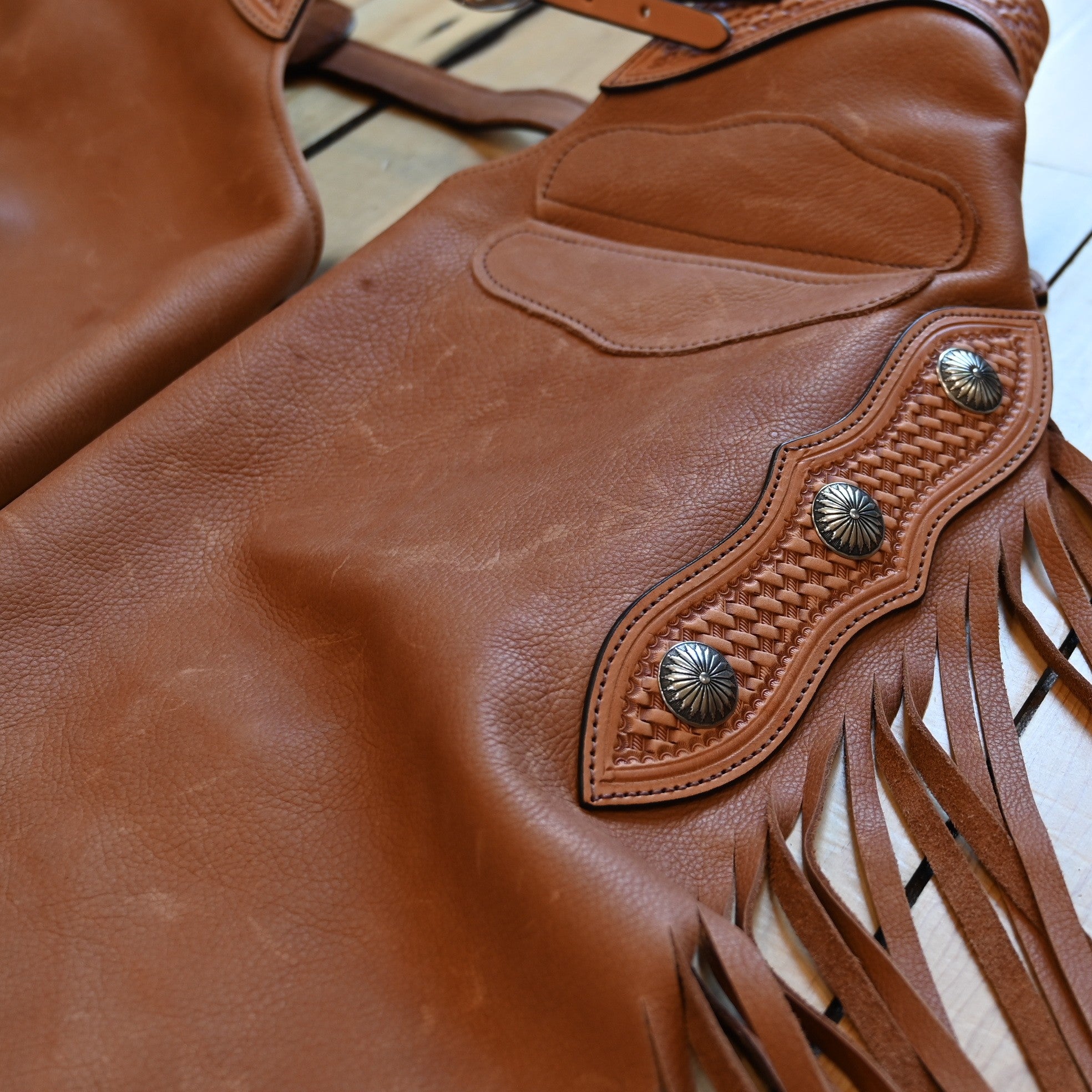 View of K Bar J Oil Tan Chinks with Basket Weave Top