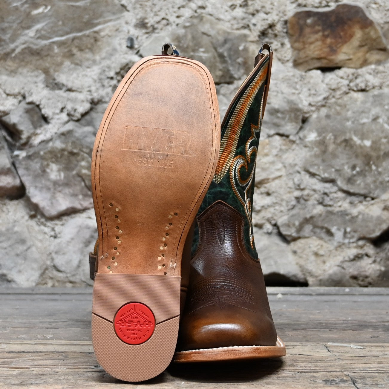 View of Hyer EASTON 11" boots showcasing brown cowhide leather vamp and green vintage cowhide top with broad square toe and Stockman block heel