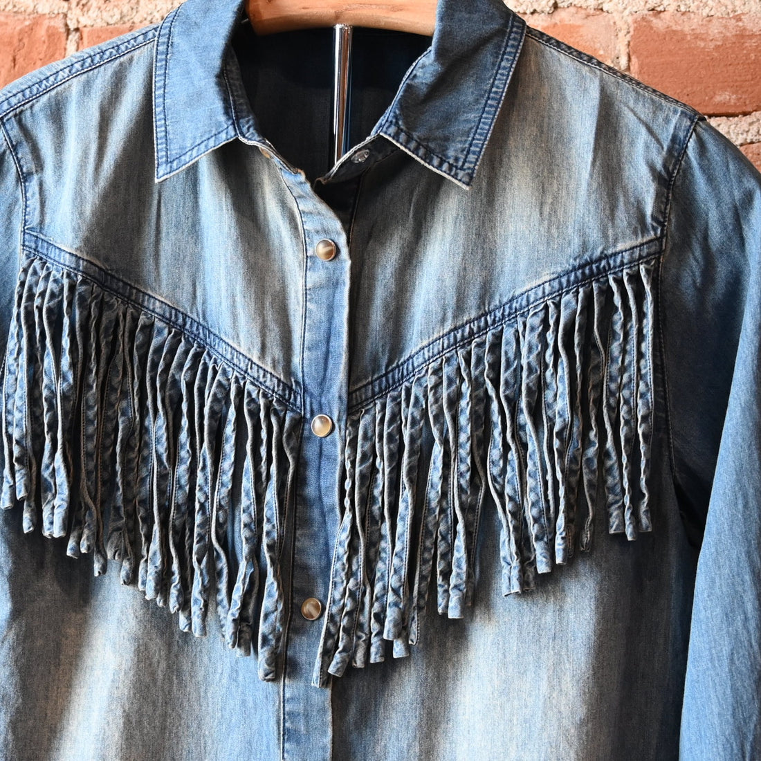 Washed blue denim Hart Shirt by Tasha Polizzi with self-fringe along front and back yokes
