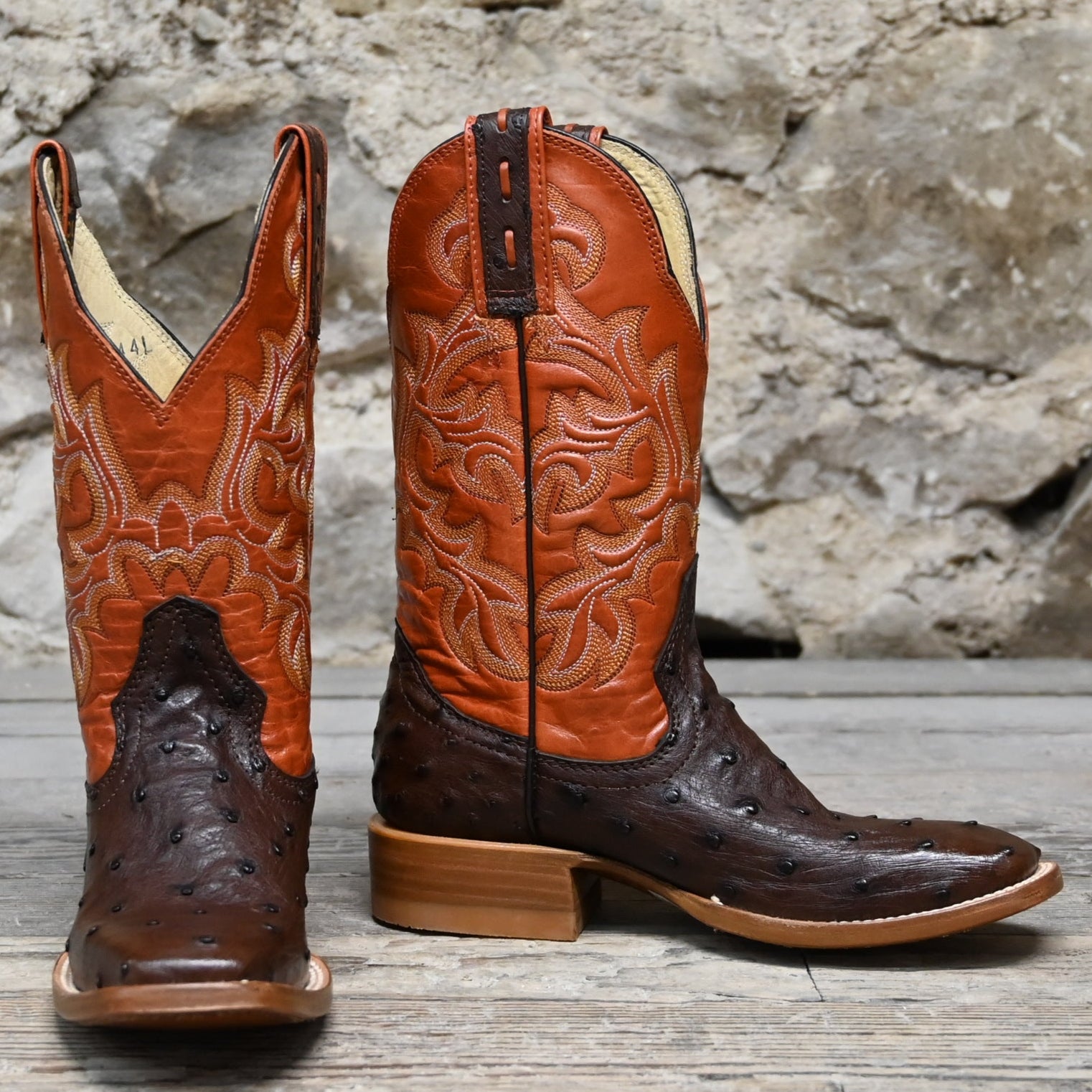 View of Hondo 11" cowboy boot with orange volcano top, brown full quill ostrich vamp, and medium square toe