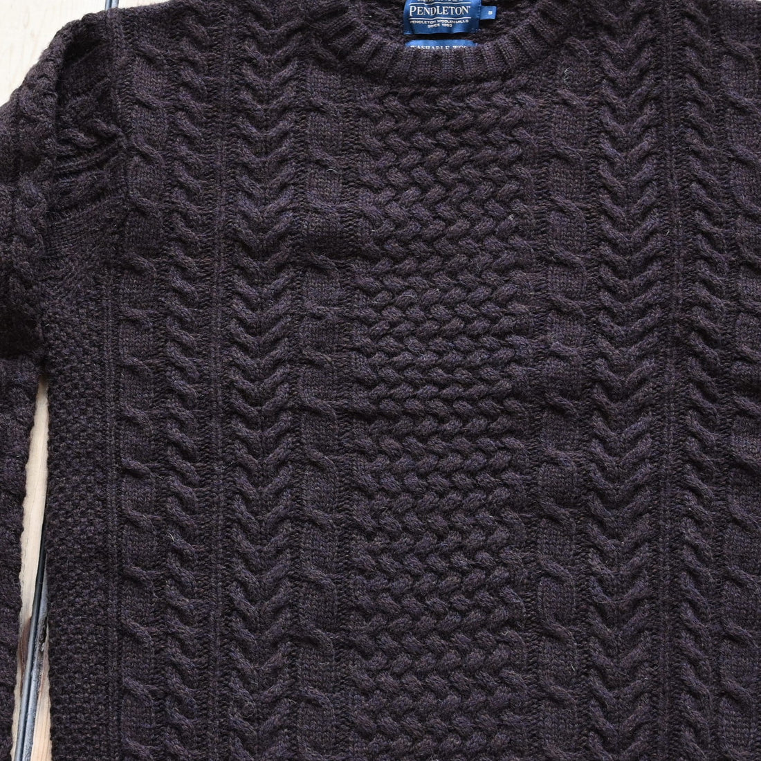 View of Pendleton men’s wool fisherman sweater in Espresso Heather with cable knit texture
