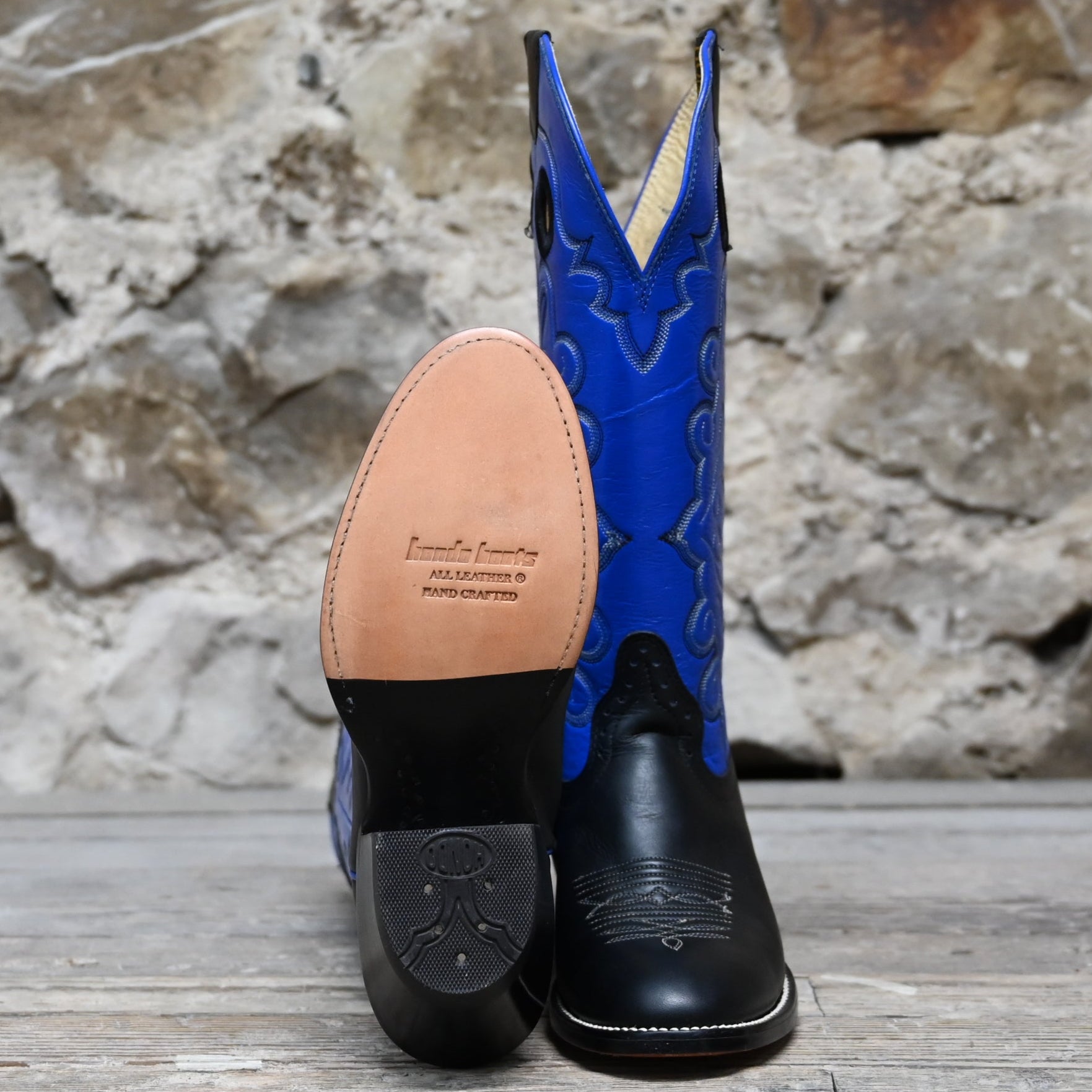 View of Hondo 14" cowboy boot with royal blue top, black retan vamp, medium round toe, and spur ledge