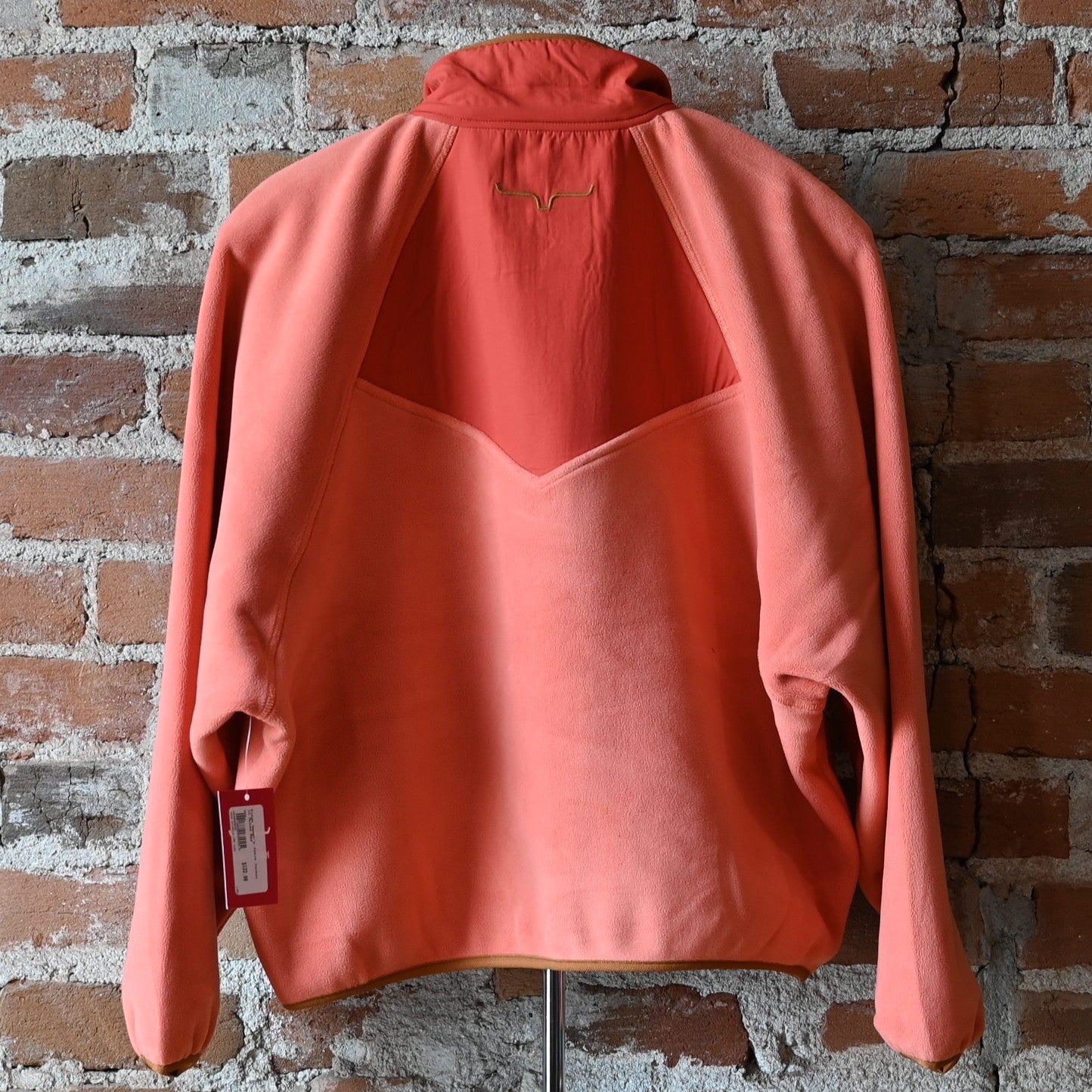 Kimes Ranch Ladies Josie Pullover in muted red fleece with front pocket and stitched longhorn logo