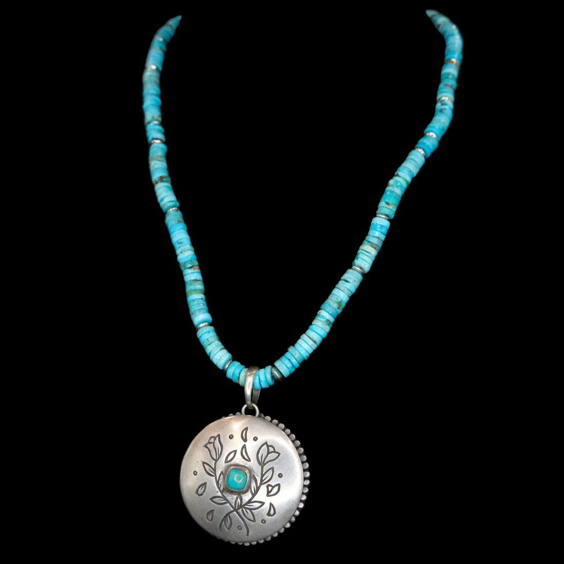 Peyote Bird turquoise beaded necklace with silver and turquoise locket displayed on black bust