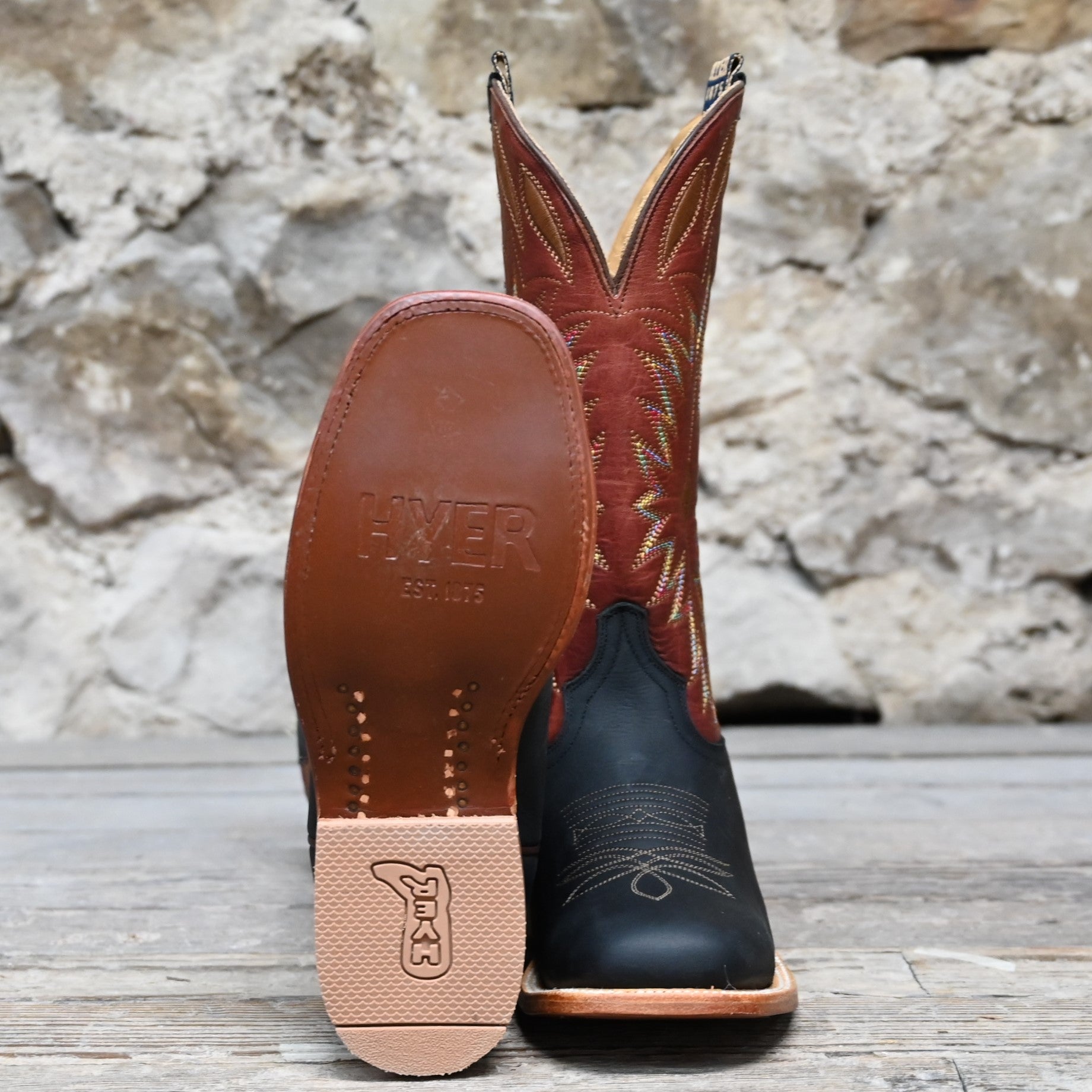 View of Hyer CHERRYVALE 13" boots showcasing cognac Garrison goat leather upper and black mule cowhide vamp with broad square toe and Stockman block heel